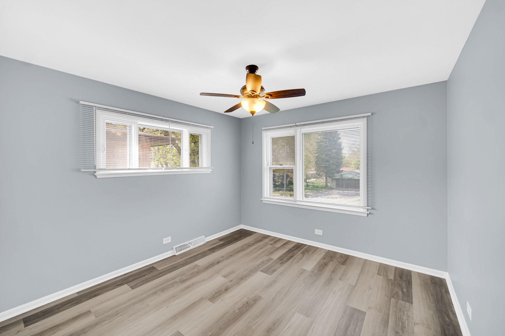 1817 171st Street, Unit 2 Hazel Crest, IL 60429 - Photo 4 of 11 a view of an empty room with a window