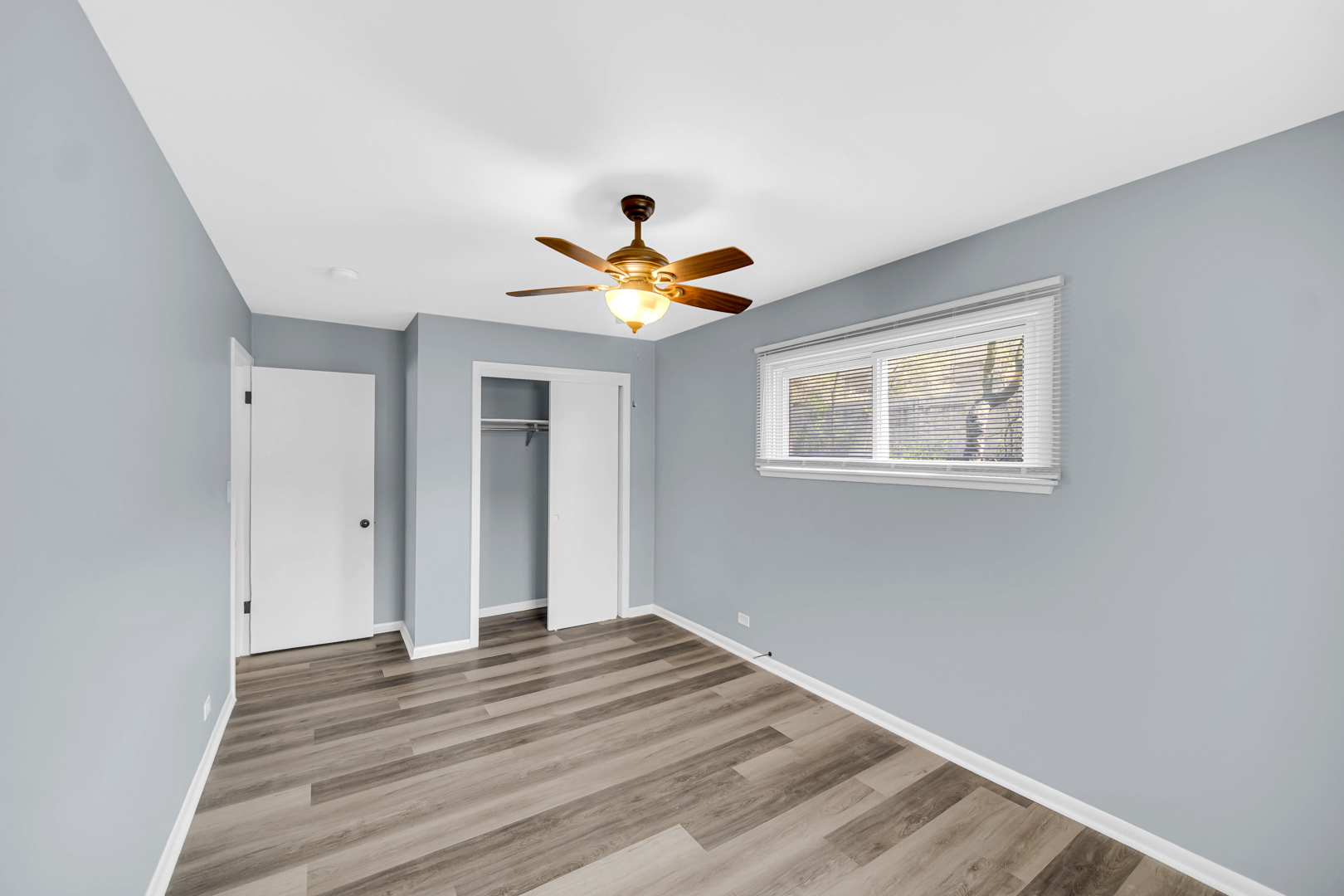 1817 171st Street, Unit 2 Hazel Crest, IL 60429 - Photo 7 of 11 a view of empty room with wooden floor