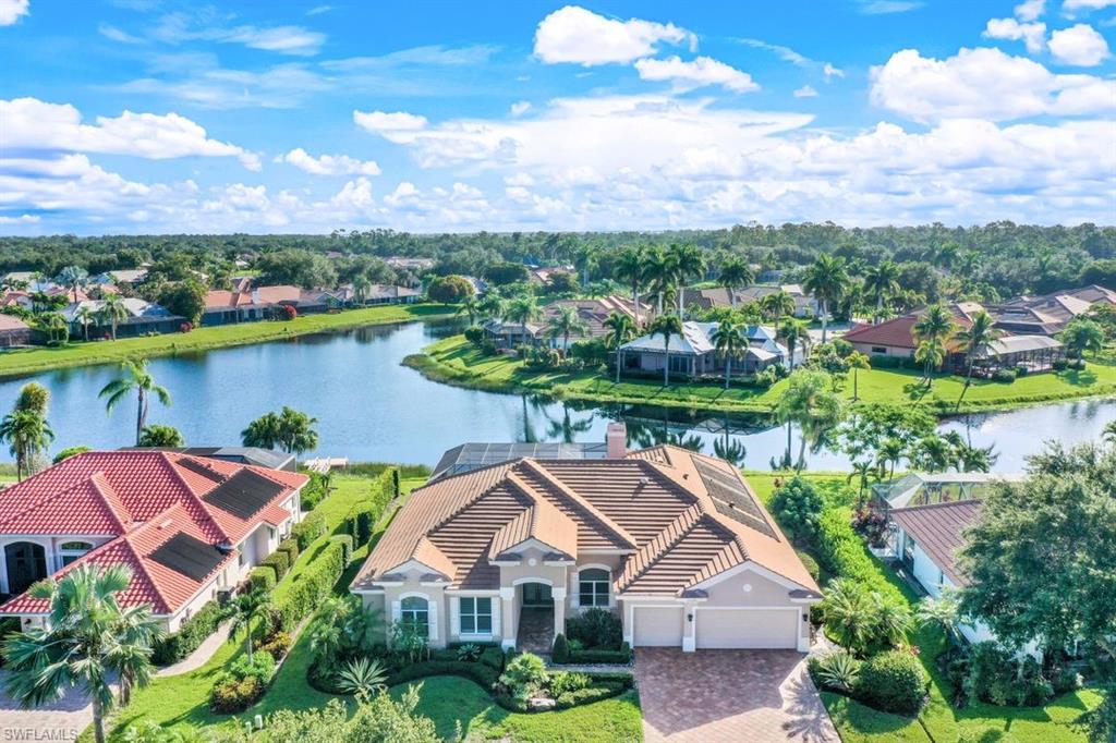 11124 Phoenix Way Naples, FL 34119 - Photo 1 of 1 Aerial view with a water view