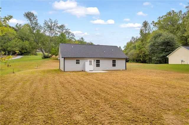 a house view with a garden space