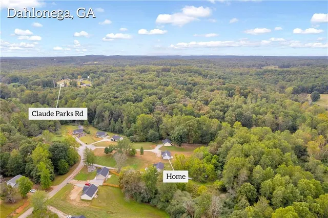 a sign broad on the side of a road