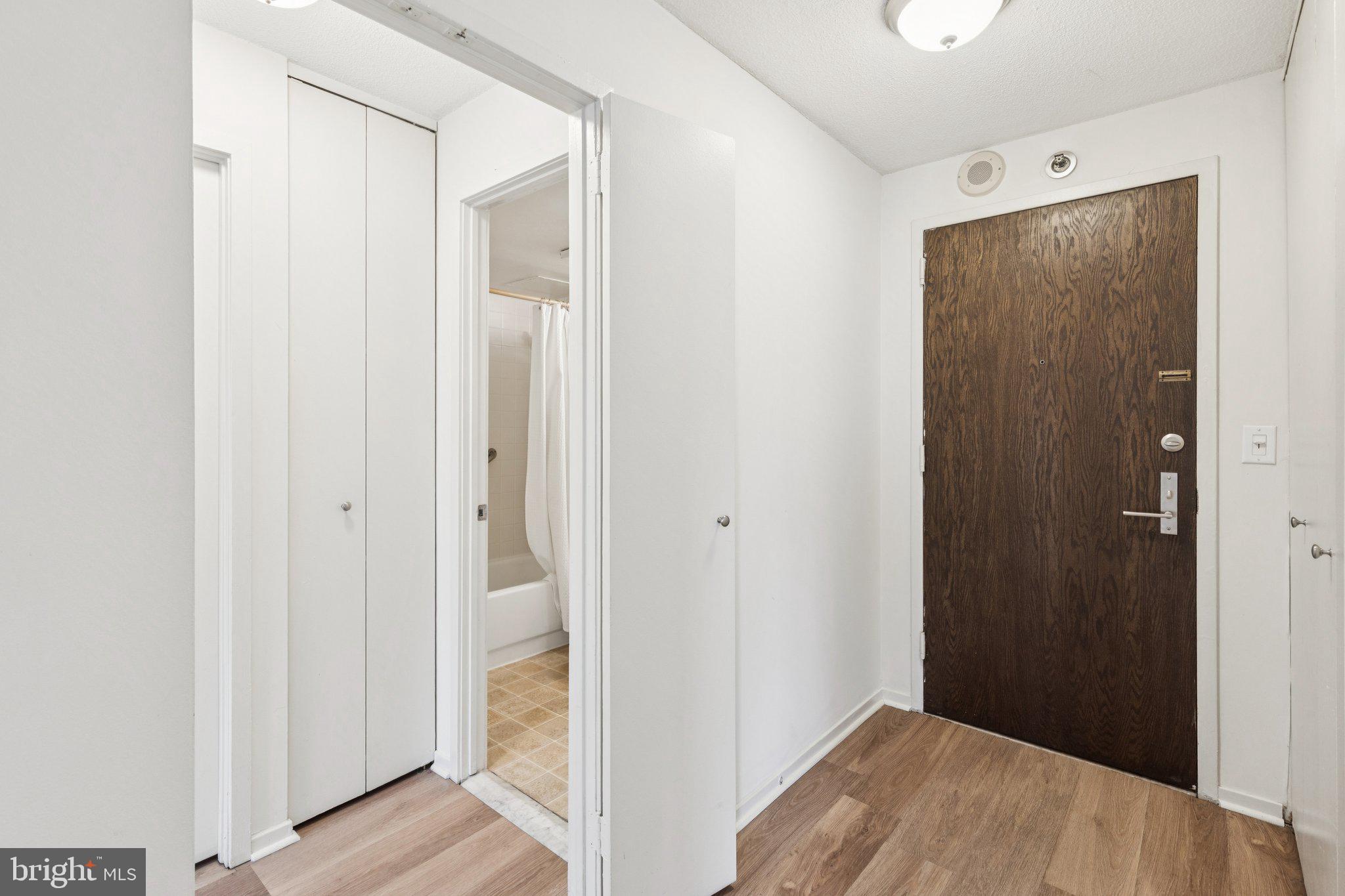 2020 Walnut Street, Unit 14J Philadelphia, PA 19103 - Photo 12 of 25 a view of hallway with wooden floor