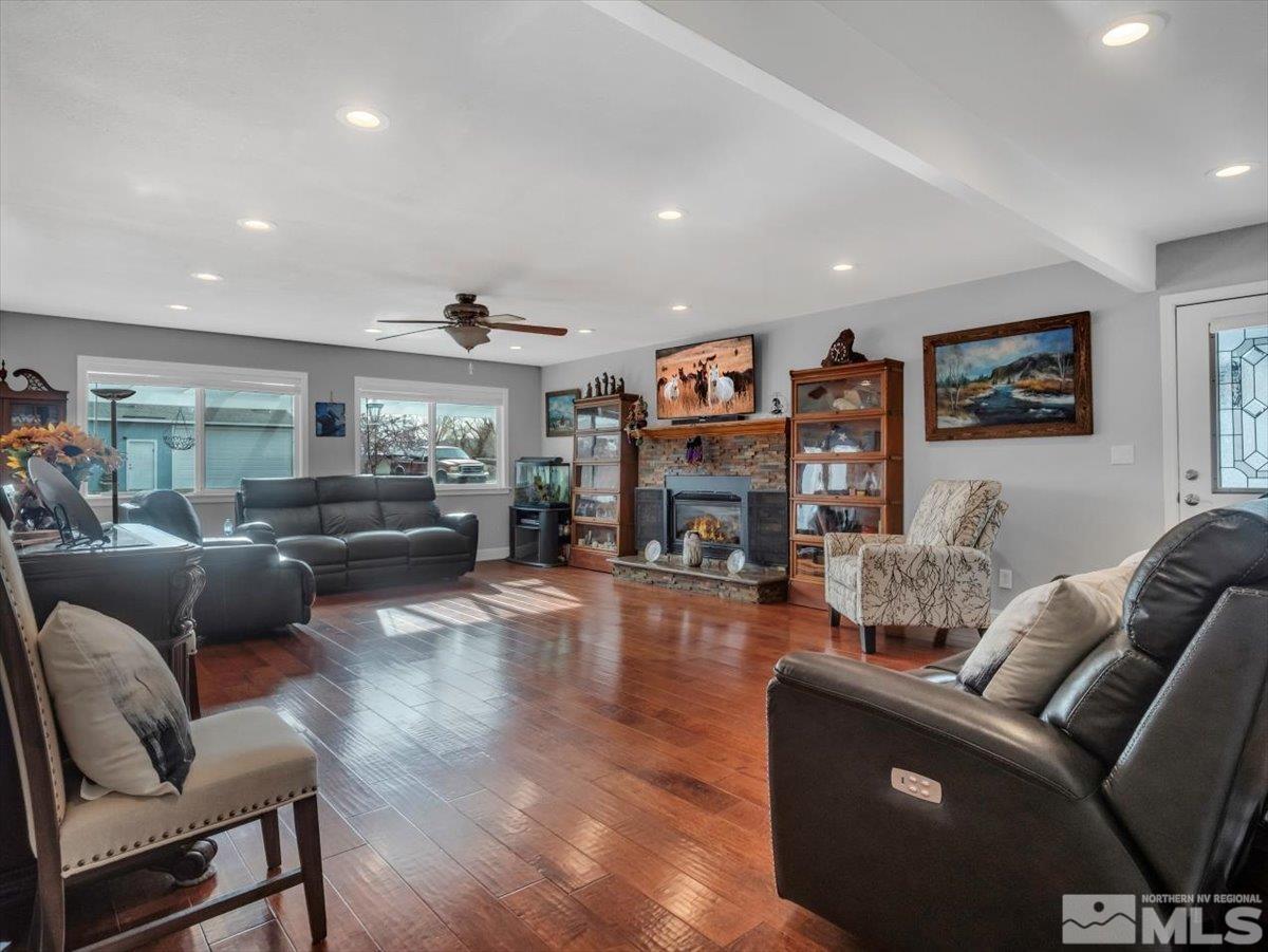 835 Russell Way Gardnerville, NV 89460 - Photo 3 of 40 a living room with furniture and a flat screen tv