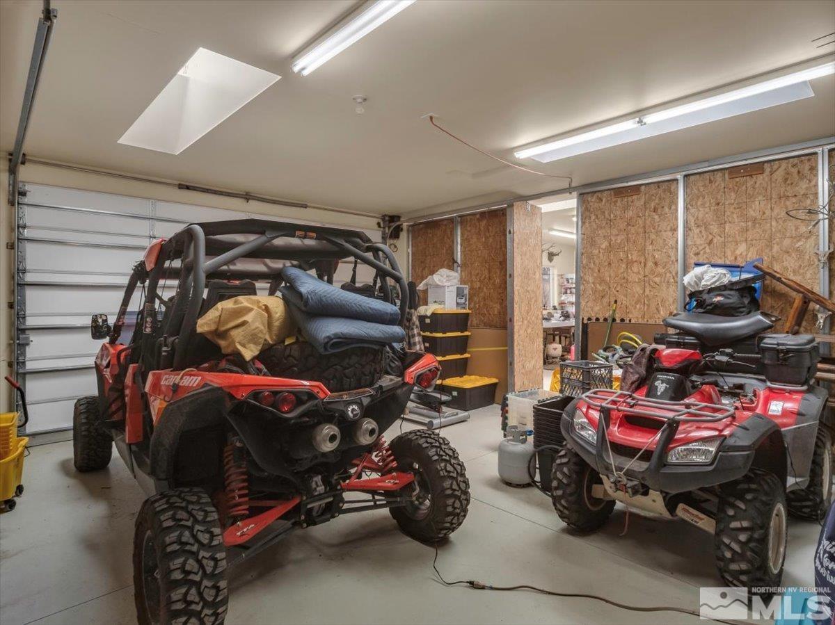 835 Russell Way Gardnerville, NV 89460 - Photo 31 of 40 a bedroom with furniture and a bed