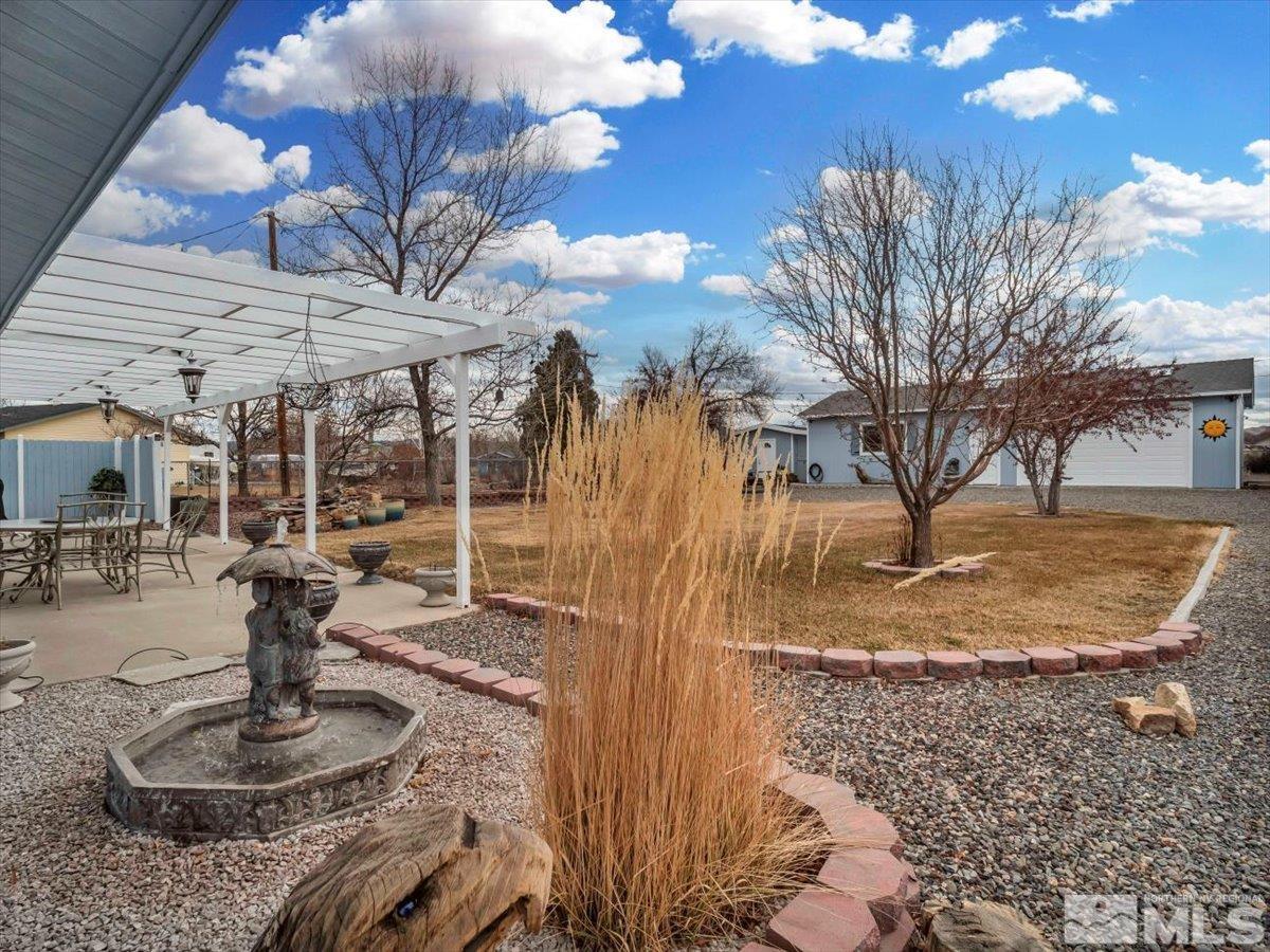 835 Russell Way Gardnerville, NV 89460 - Photo 37 of 40 a view of a backyard with plants