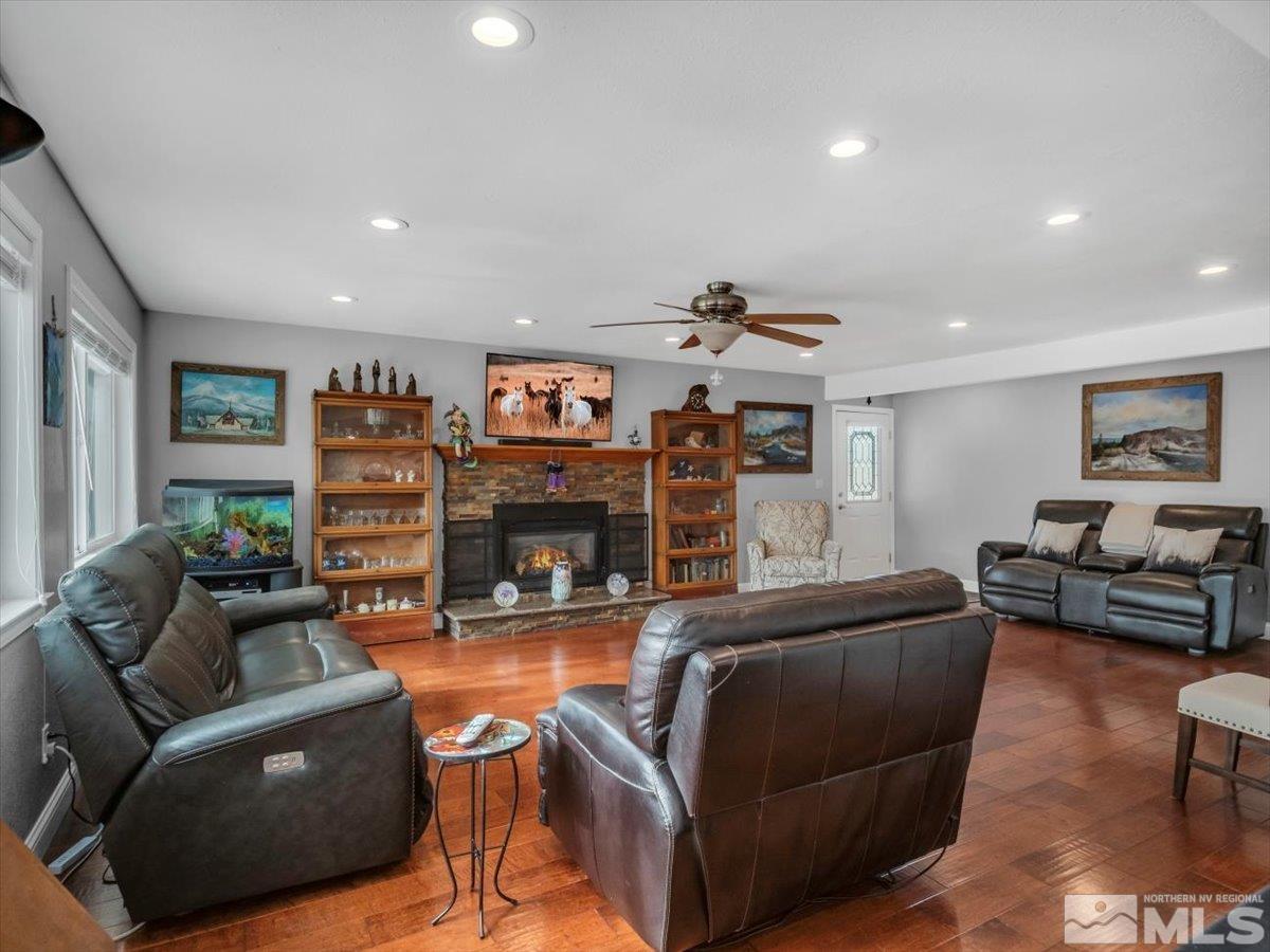 835 Russell Way Gardnerville, NV 89460 - Photo 4 of 40 a living room with furniture and a fireplace