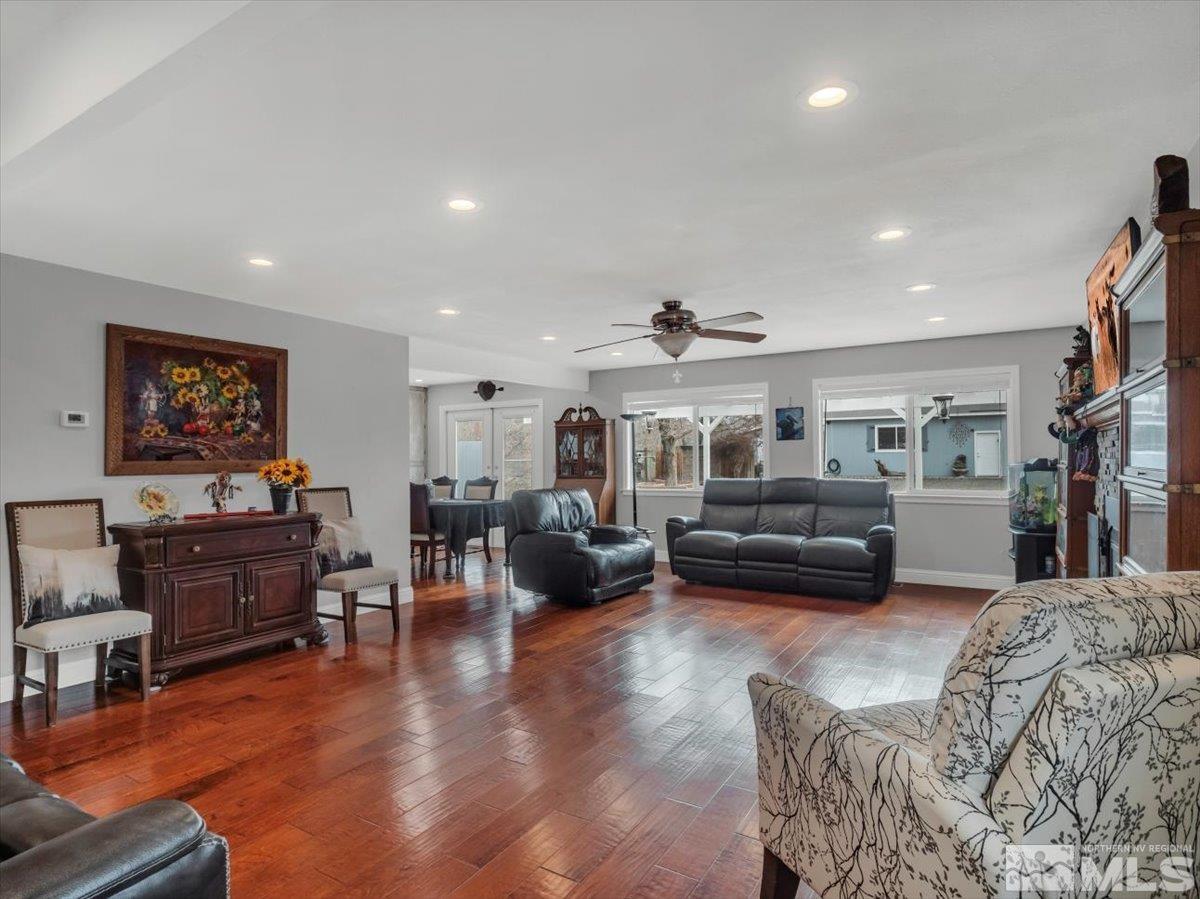 835 Russell Way Gardnerville, NV 89460 - Photo 6 of 40 a living room with furniture and a flat screen tv