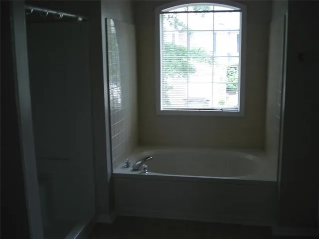 a bathroom with a sink and vanity