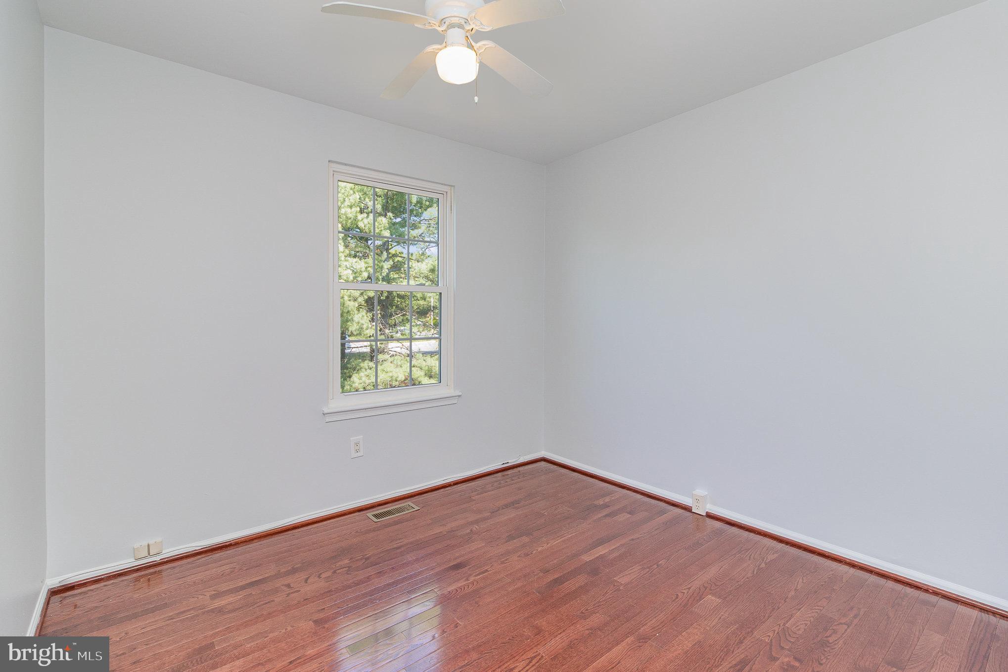 14888 Enterprise Lane Woodbridge, VA 22191 - Photo 15 of 25 an empty room with a window