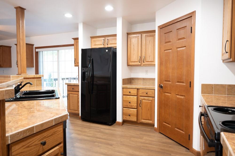 116 Autumn Street Aliquippa, PA 15001 - Photo 5 of 26 a kitchen with a refrigerator stove and sink