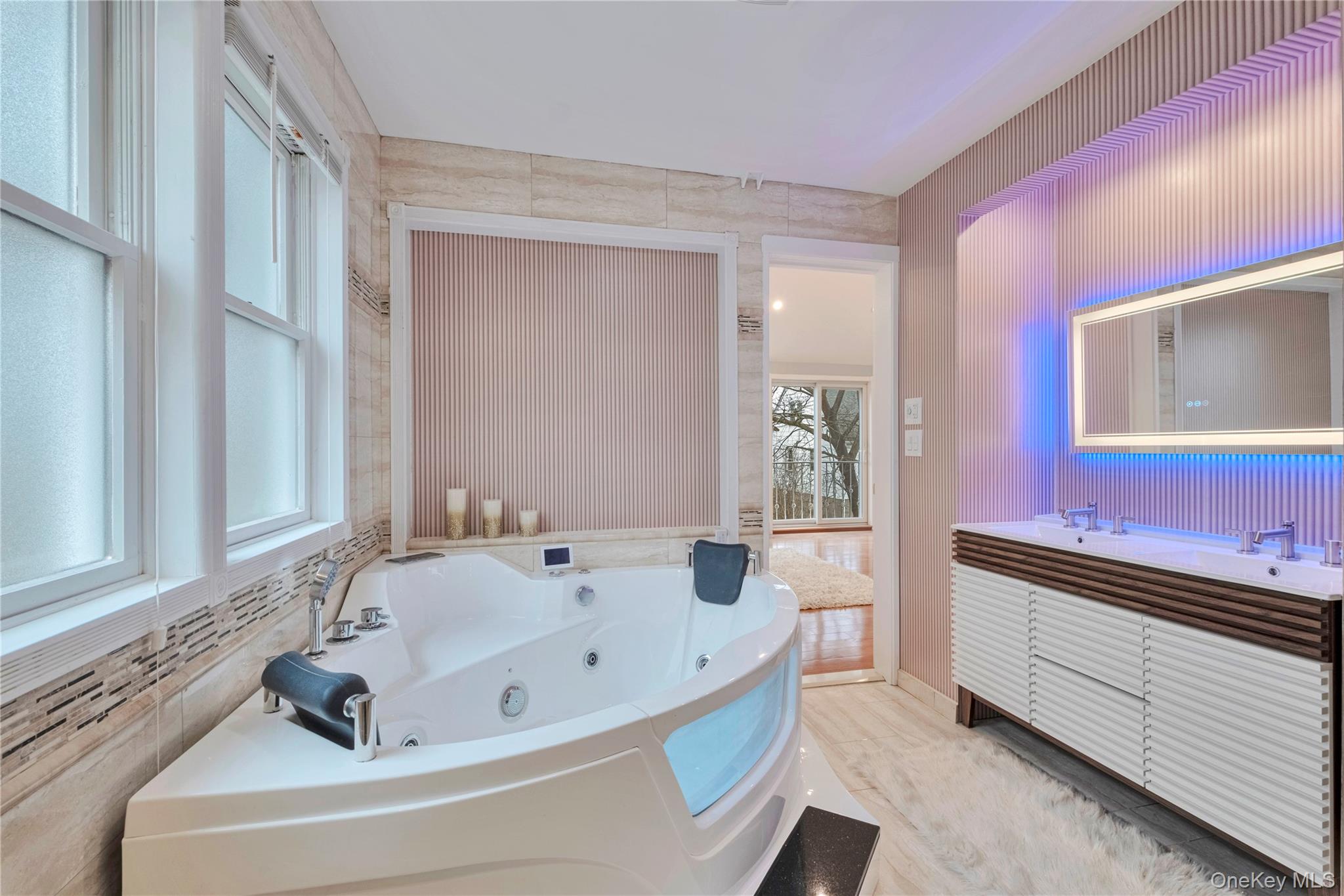 193 Nelson Road Scarsdale, NY 10583 - Photo 22 of 37 a bathroom with a bathtub and a sink