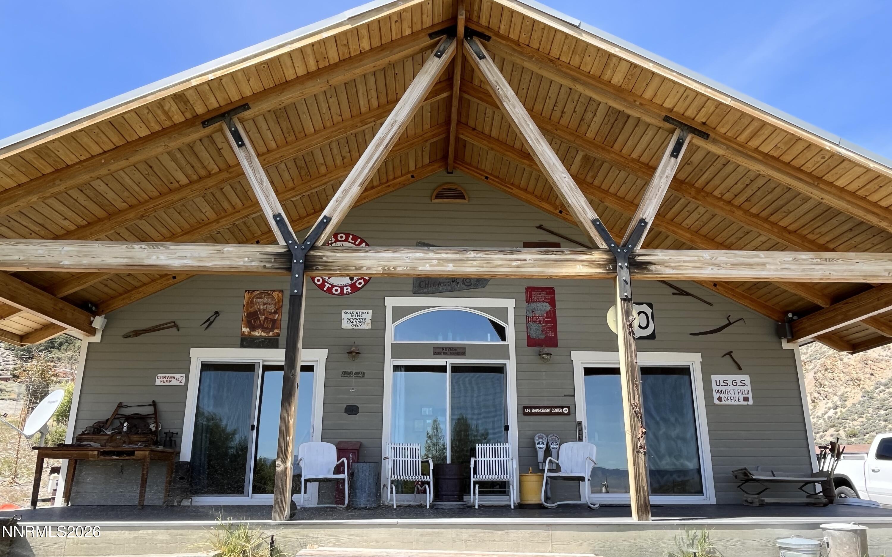 15 Wine Glass Way Kingston, NV 89310 - Photo 2 of 59 a view of a building with a ceiling fan