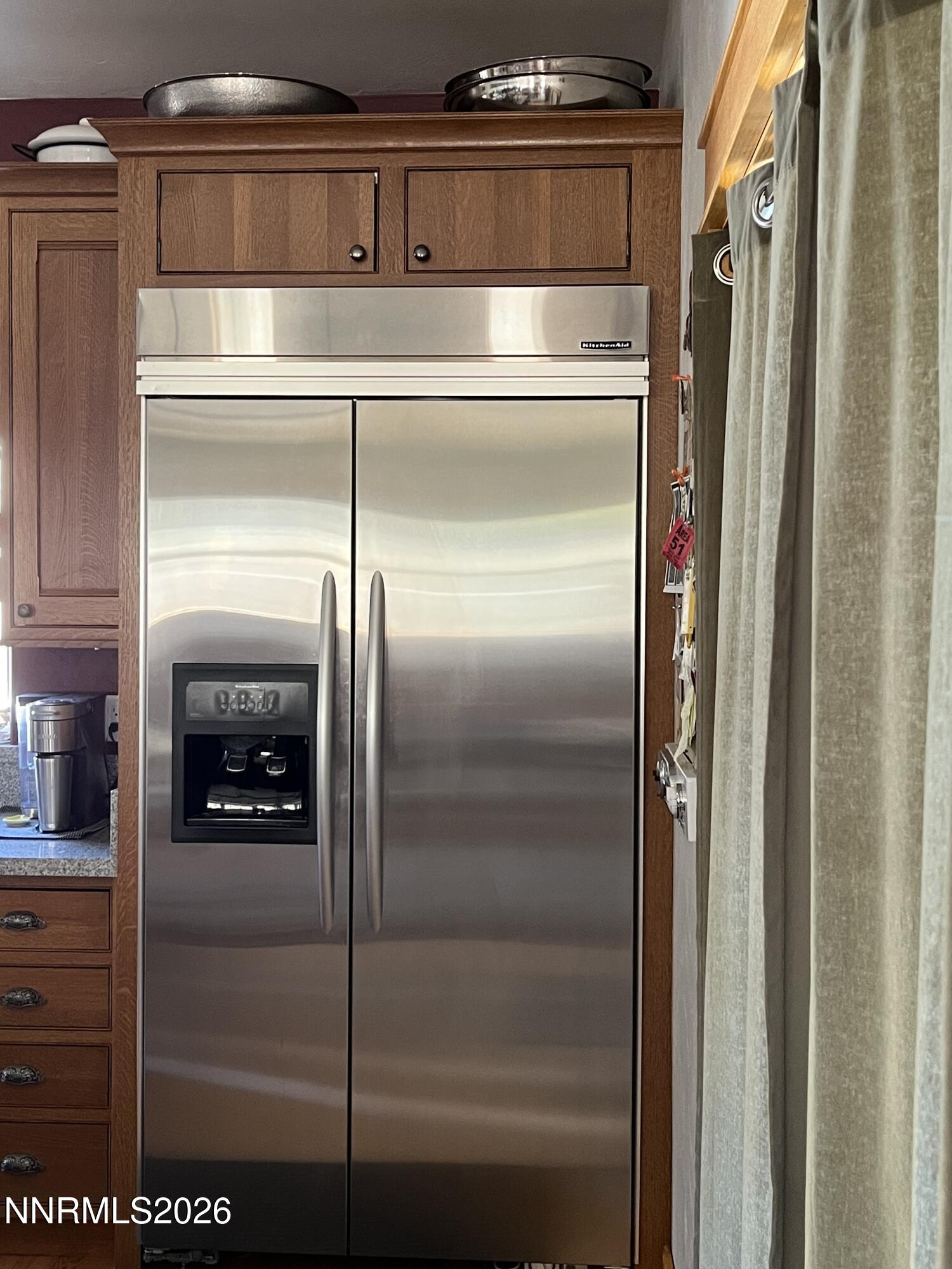15 Wine Glass Way Kingston, NV 89310 - Photo 25 of 59 a close view of a refrigerator in a kitchen