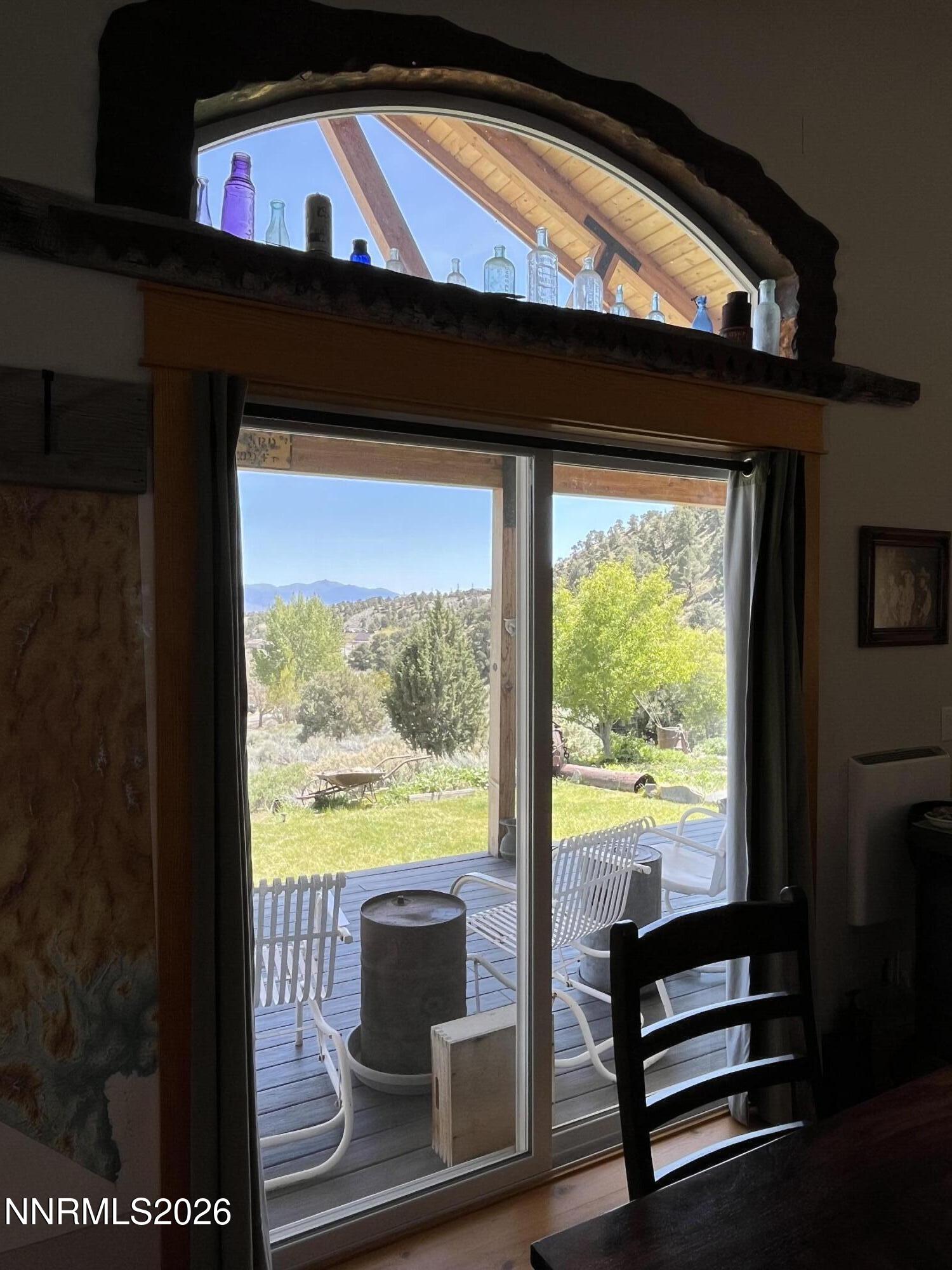 15 Wine Glass Way Kingston, NV 89310 - Photo 10 of 59 a view of two chairs and a table in a balcony