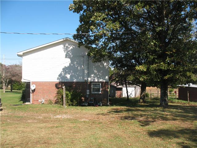 1266 Claylick Road White Bluff, TN 37187 - Photo 8 of 14 Side view with nice shade tree.
