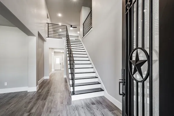 a view of entryway with wooden floor