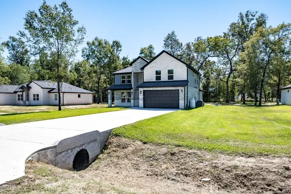 a view of a house with a swimming pool