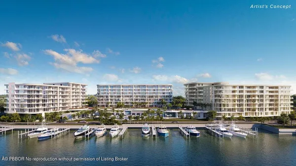 a view of water with a multi story building and lake view