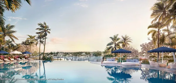 a view of swimming pool with outdoor seating and lake view