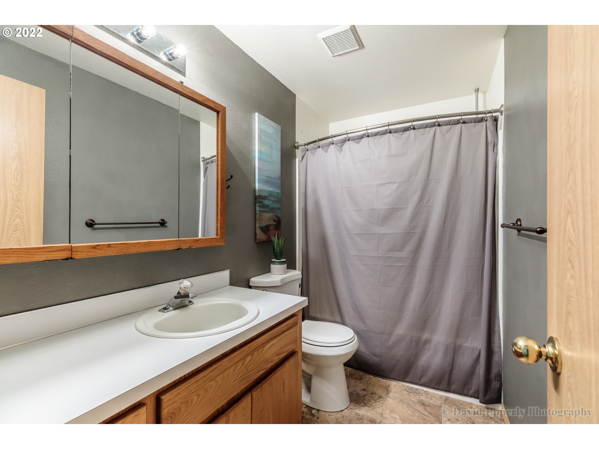 73722 Sold Road Rainier, OR 97048 - Photo 15 of 24 a bathroom with a sink toilet a mirror and shower