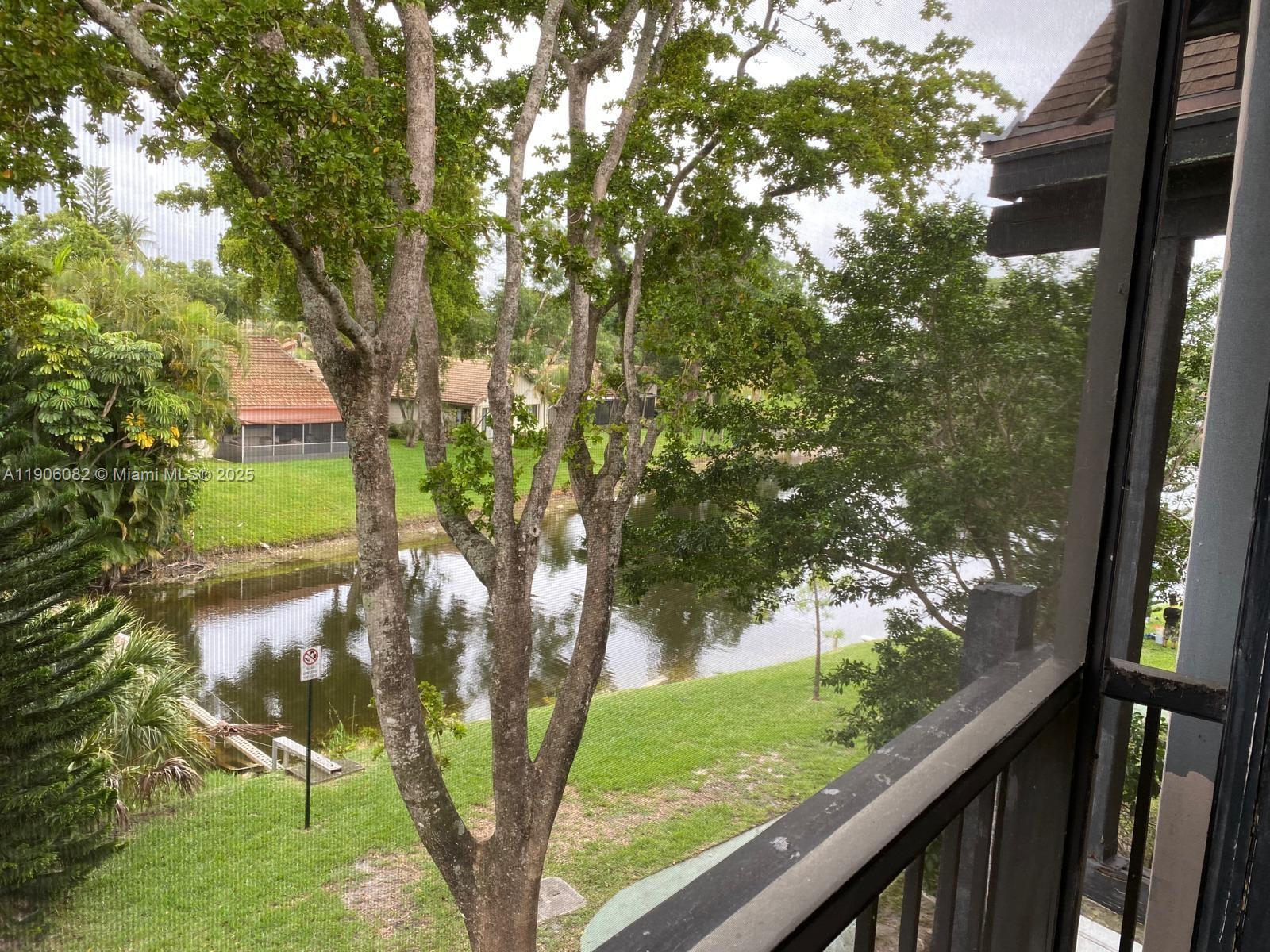 3730 Inverrary Drive, Unit 3B Lauderhill, FL 33319 - Photo 19 of 53 a view of a yard from a balcony