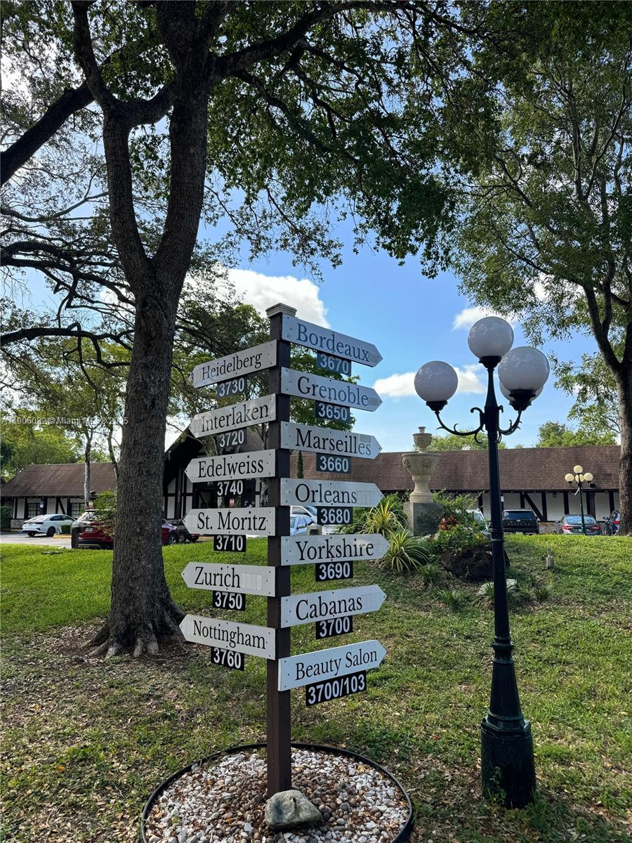 3730 Inverrary Drive, Unit 3B Lauderhill, FL 33319 - Photo 50 of 53 a view of a yard with plants and trees