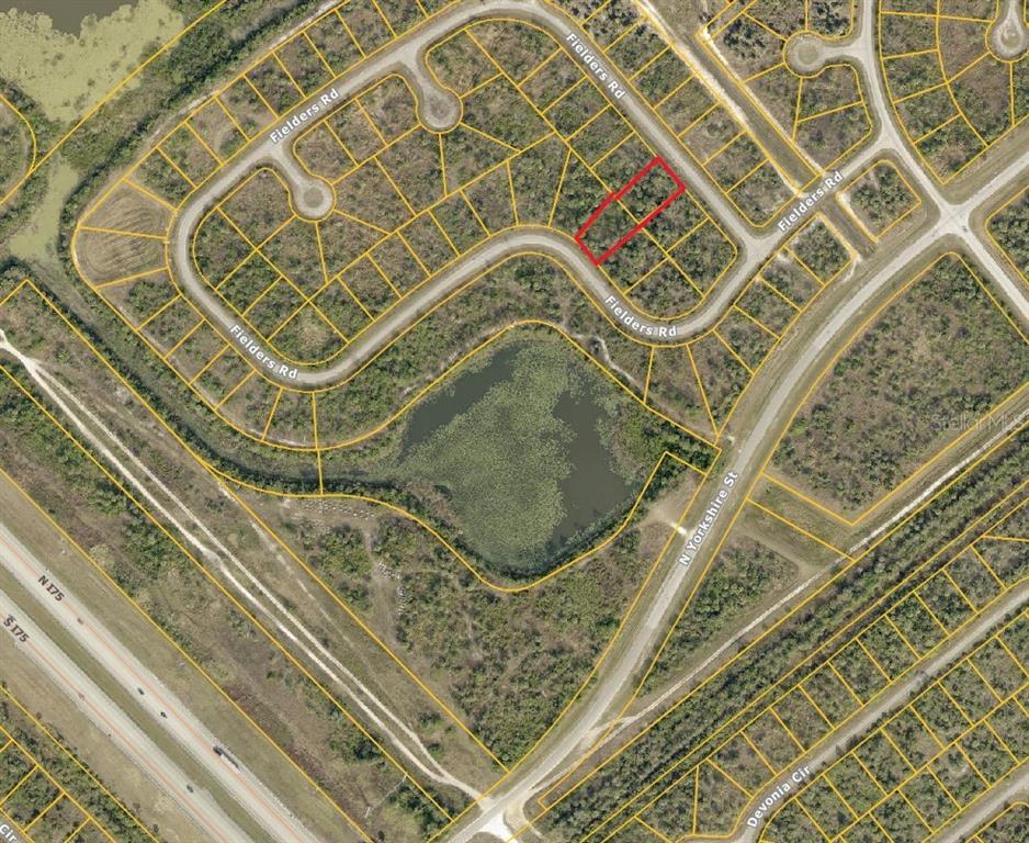 2333 Fielders (lot 21 & 26) Rd Port North Port, FL 34288 - Photo 4 of 5 an aerial view of a balcony