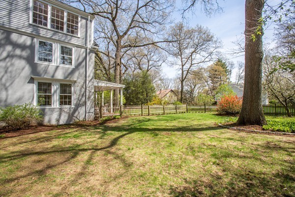 20 Boulder Road Wellesley, MA 02481 - Photo 14 of 18 a view of a house with a big yard and large trees