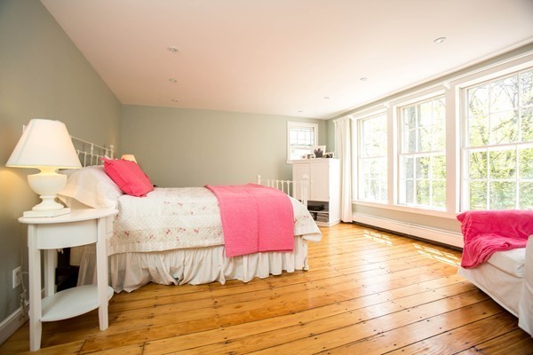 20 Boulder Road Wellesley, MA 02481 - Photo 10 of 18 a bedroom with a bed and wooden floor