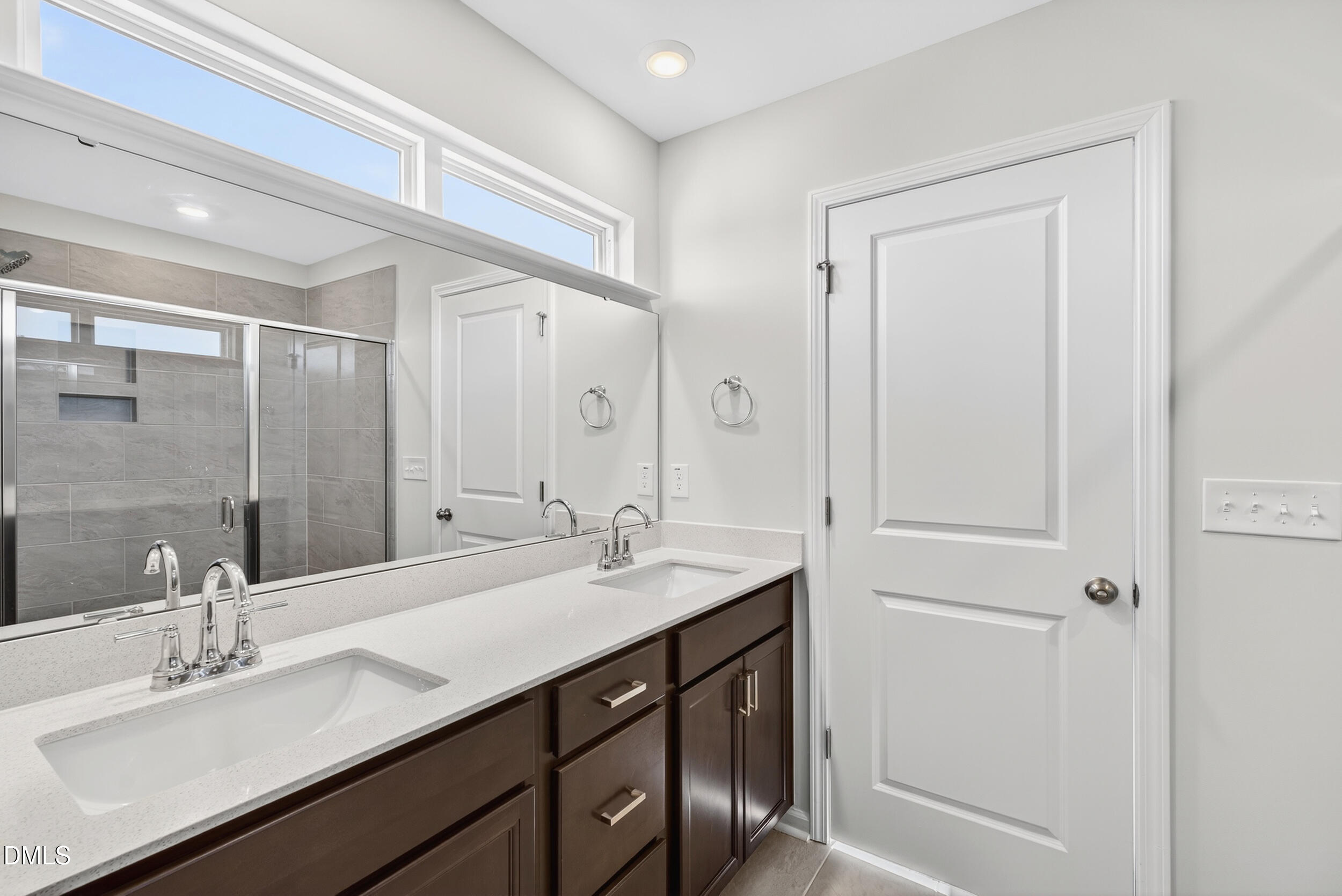 331 Chesapeake Commons Street Garner, NC 27529 - Photo 11 of 20 a bathroom with a double vanity sink mirror and