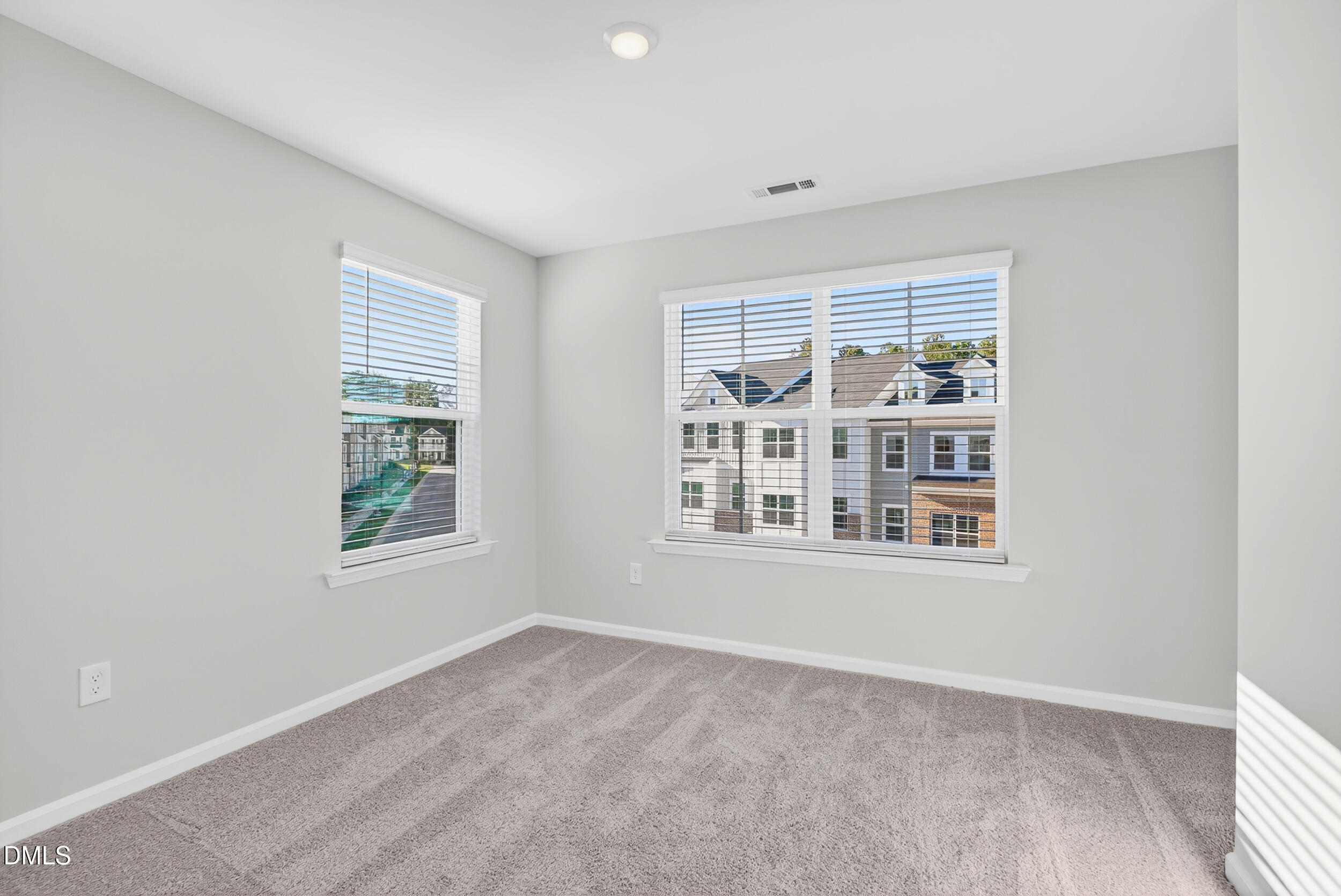 331 Chesapeake Commons Street Garner, NC 27529 - Photo 12 of 20 an empty room with a window