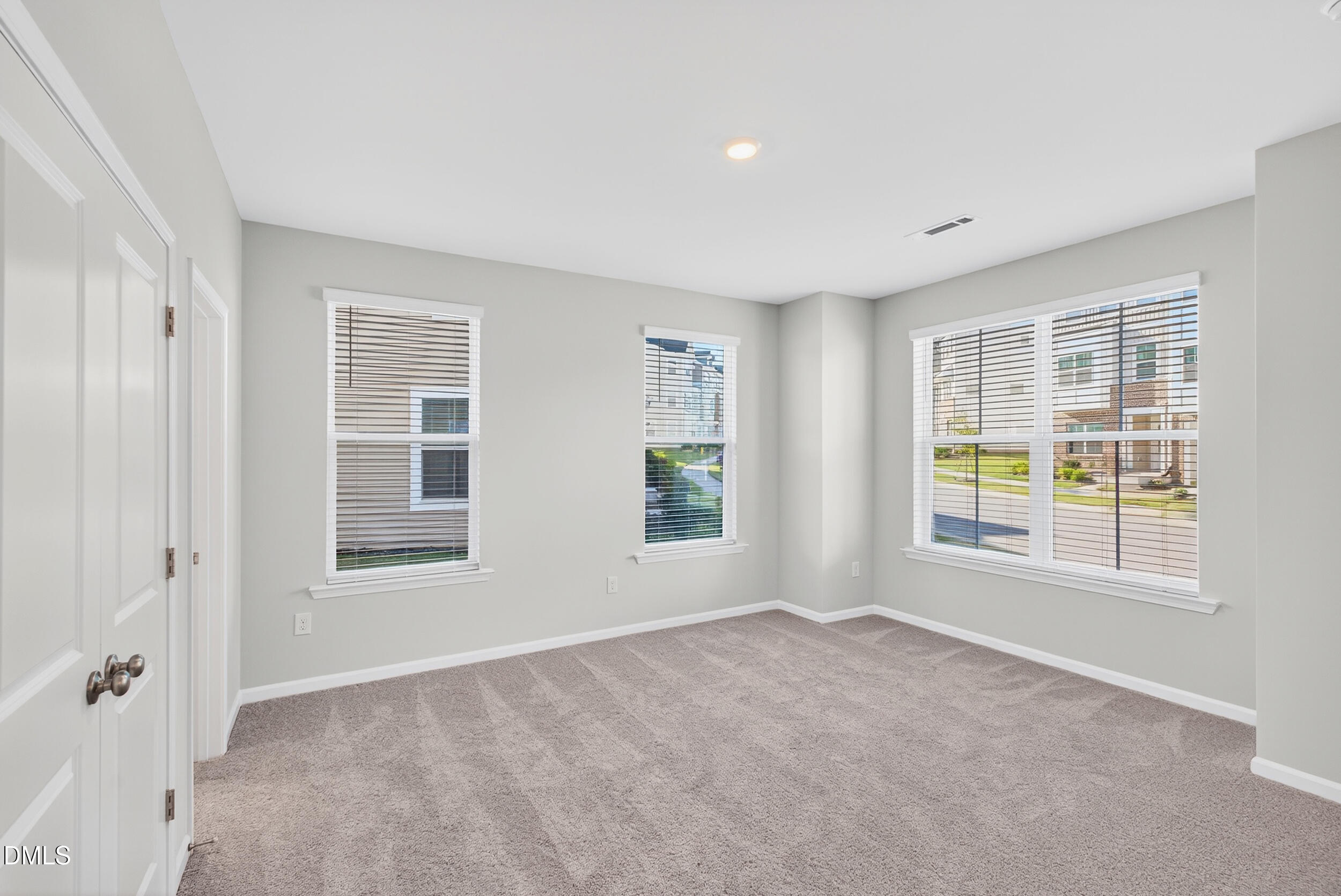 331 Chesapeake Commons Street Garner, NC 27529 - Photo 15 of 20 an empty room with windows