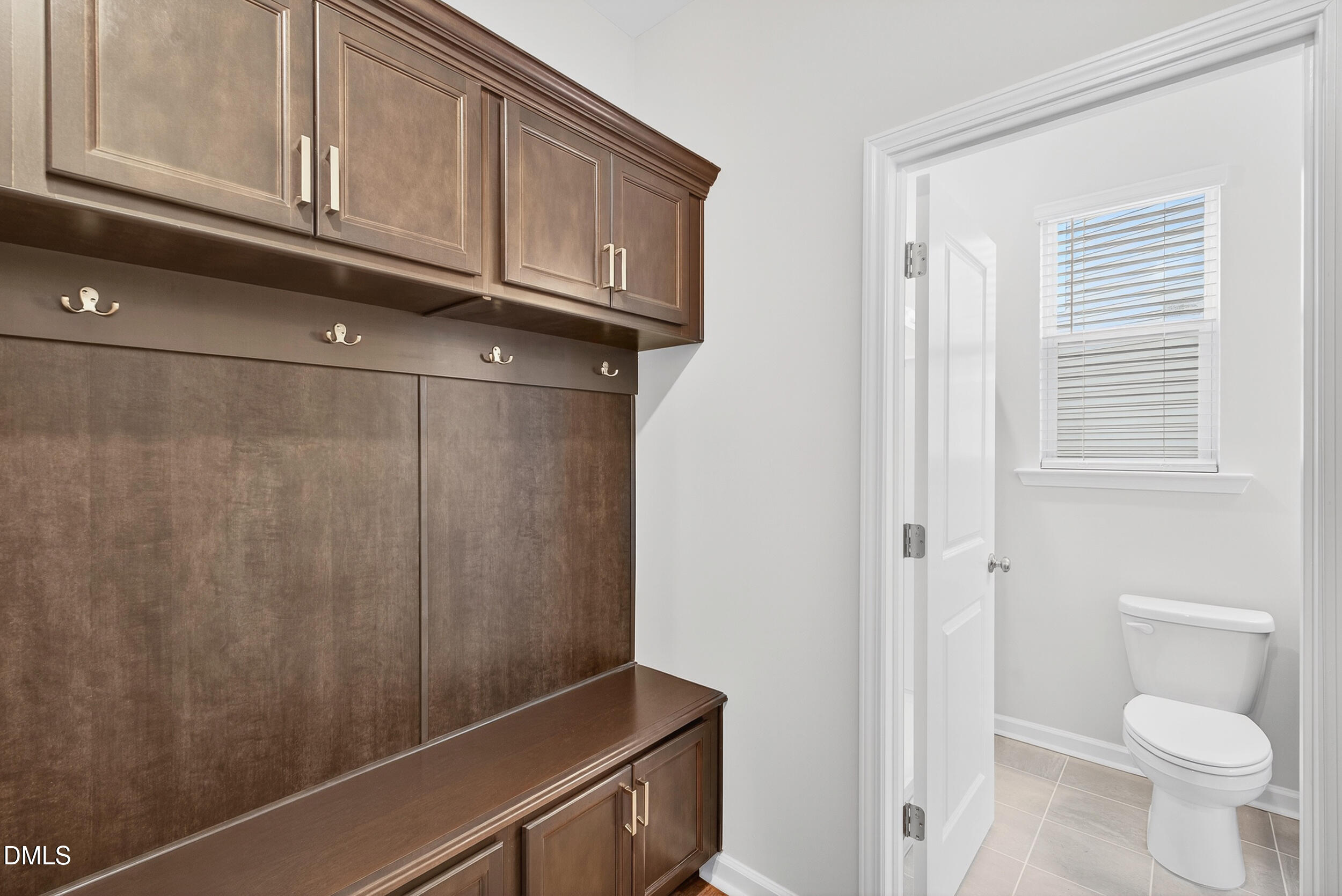 331 Chesapeake Commons Street Garner, NC 27529 - Photo 18 of 20 a bathroom with a granite countertop sink and toilet