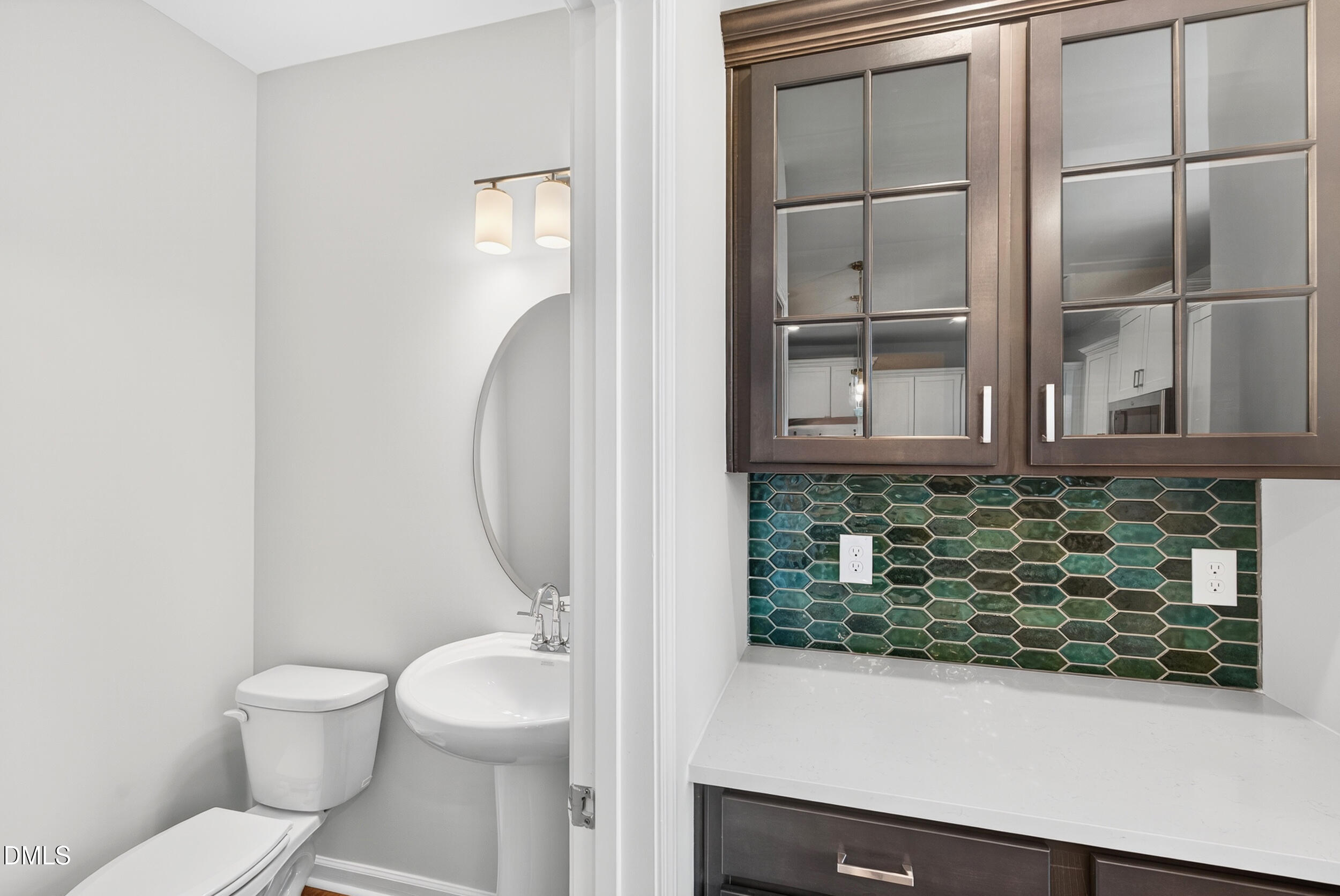 331 Chesapeake Commons Street Garner, NC 27529 - Photo 9 of 20 a bathroom with a toilet and a sink