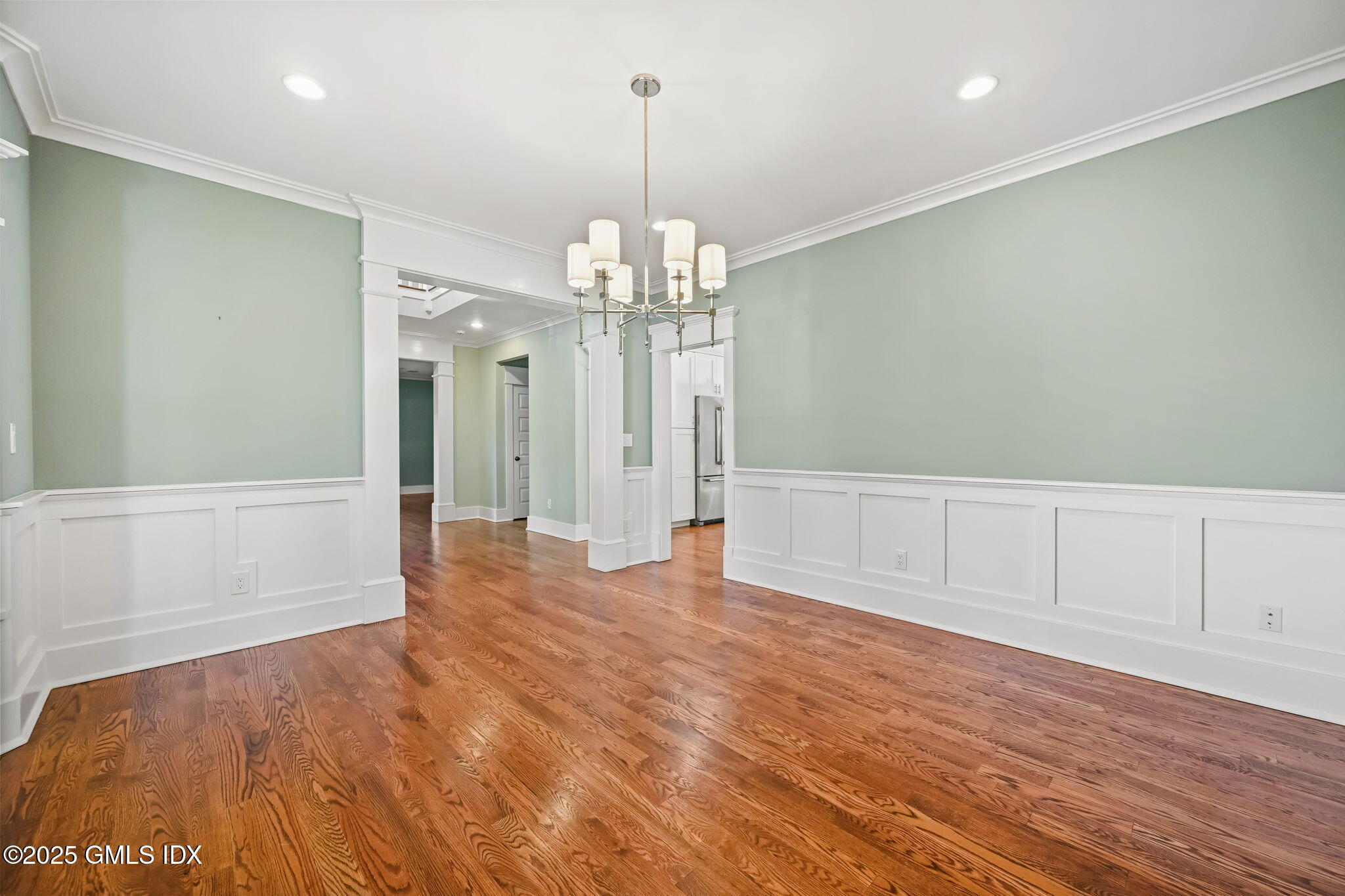12 Old Wagon Road Old Greenwich, CT 06870 - Photo 19 of 57 a view of a livingroom with a chandelier