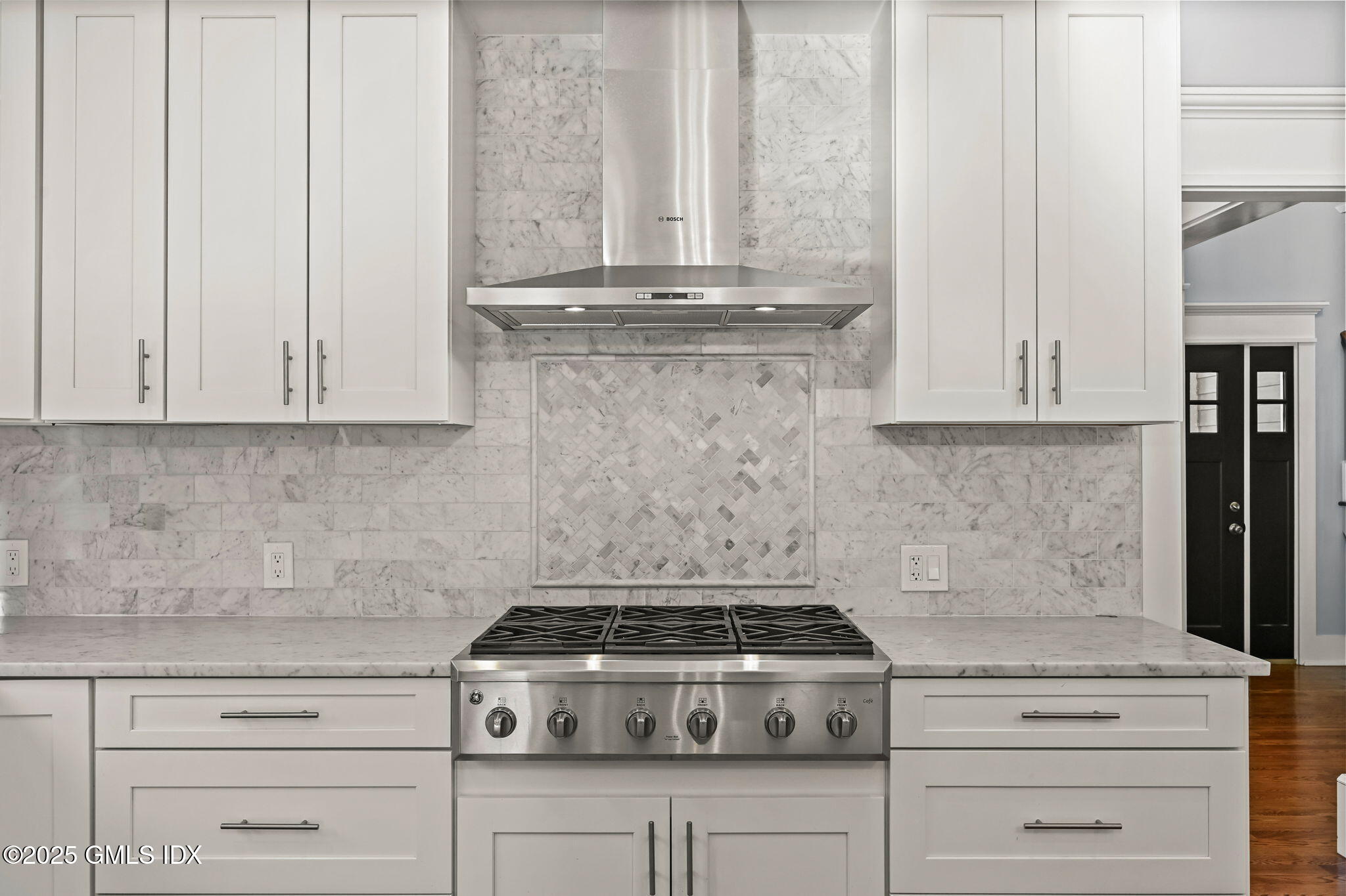 12 Old Wagon Road Old Greenwich, CT 06870 - Photo 24 of 57 a stove top oven sitting inside of a kitchen