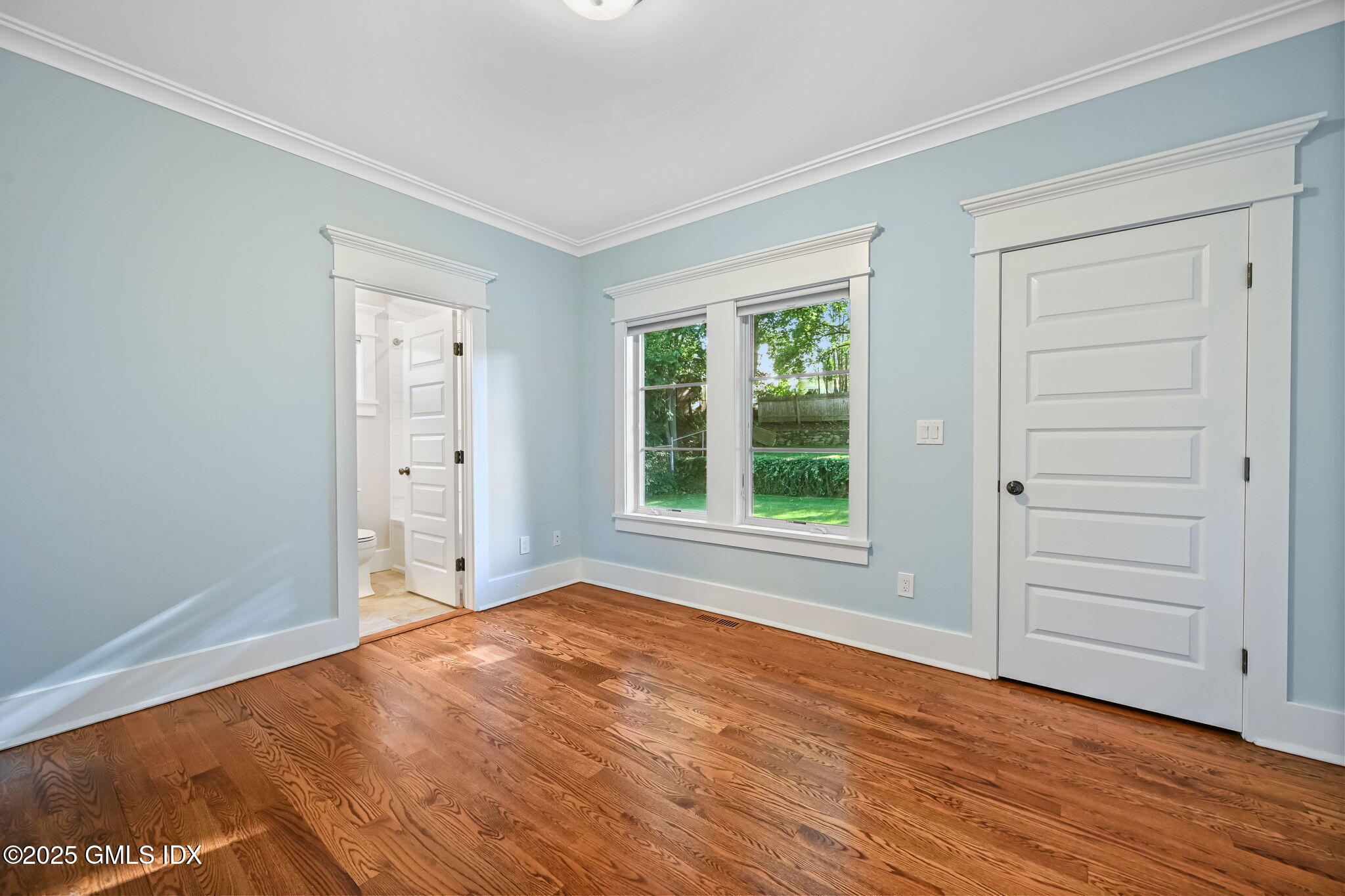 12 Old Wagon Road Old Greenwich, CT 06870 - Photo 26 of 57 wooden floor and windows in a room