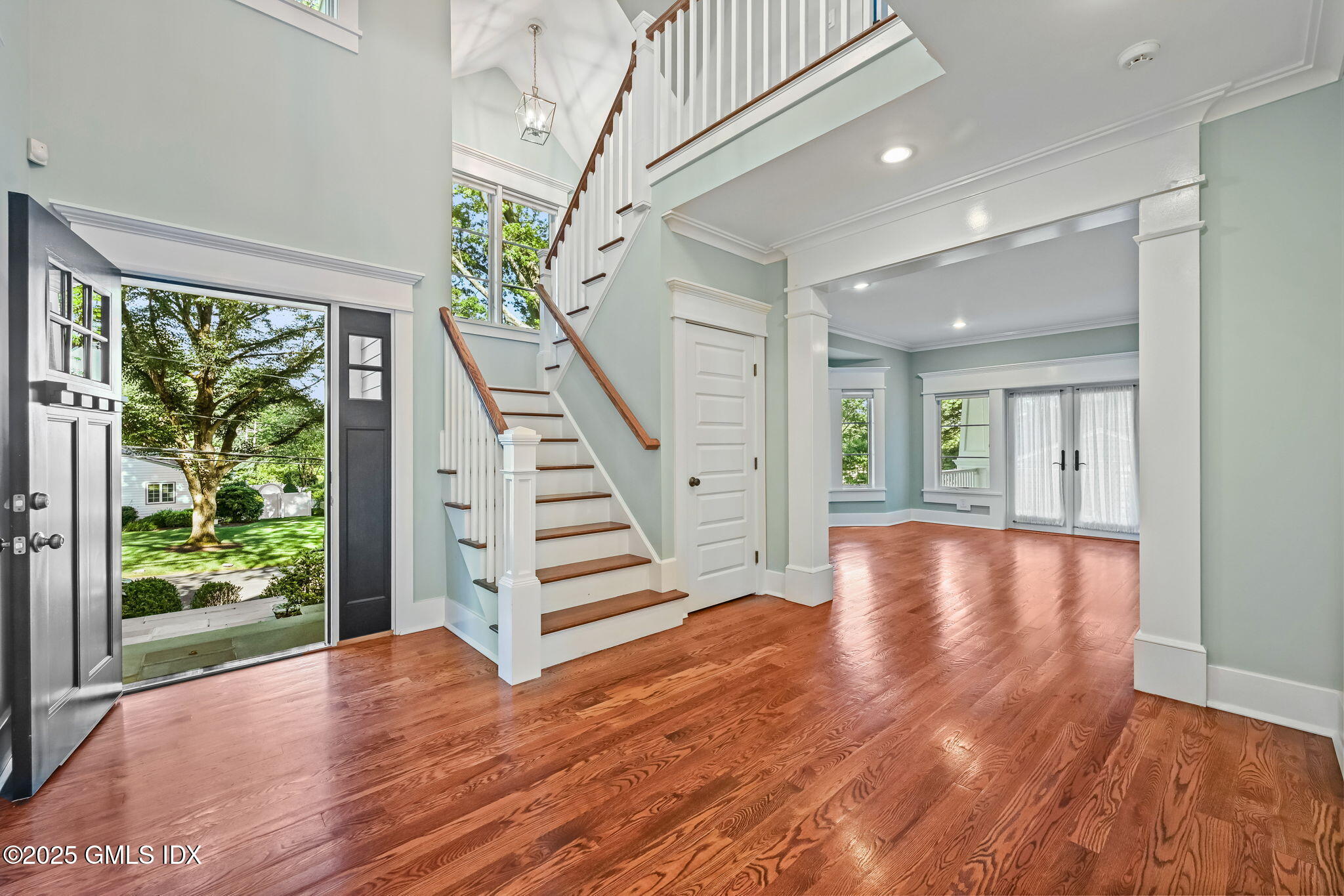 12 Old Wagon Road Old Greenwich, CT 06870 - Photo 3 of 57 a view of entryway with wooden floor and front door