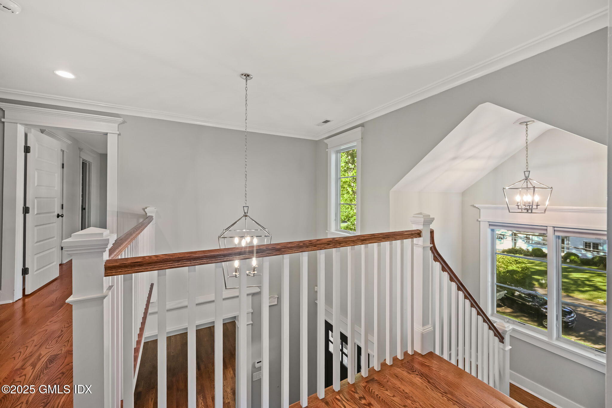 12 Old Wagon Road Old Greenwich, CT 06870 - Photo 31 of 57 a view of a hallway with windows