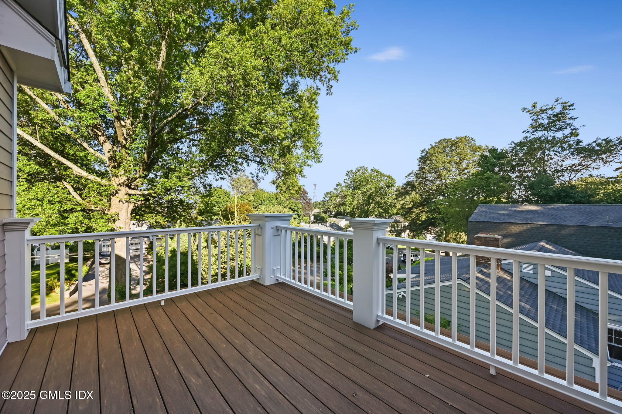 12 Old Wagon Road Old Greenwich, CT 06870 - Photo 34 of 57 a view of balcony with wooden floor and fence