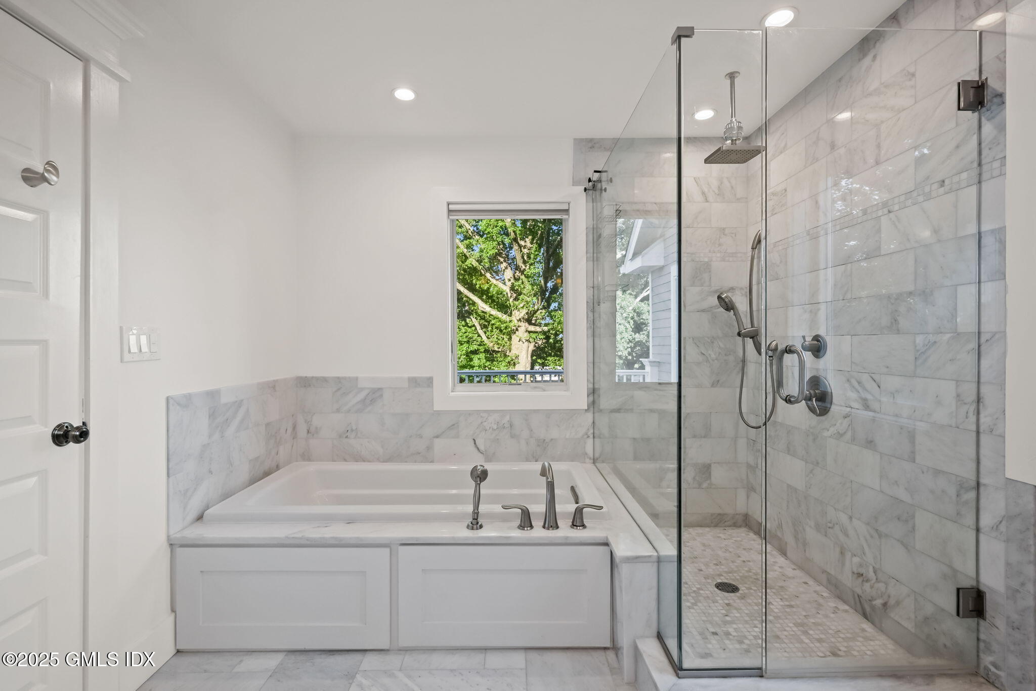 12 Old Wagon Road Old Greenwich, CT 06870 - Photo 36 of 57 a bathroom with a bathtub and a shower