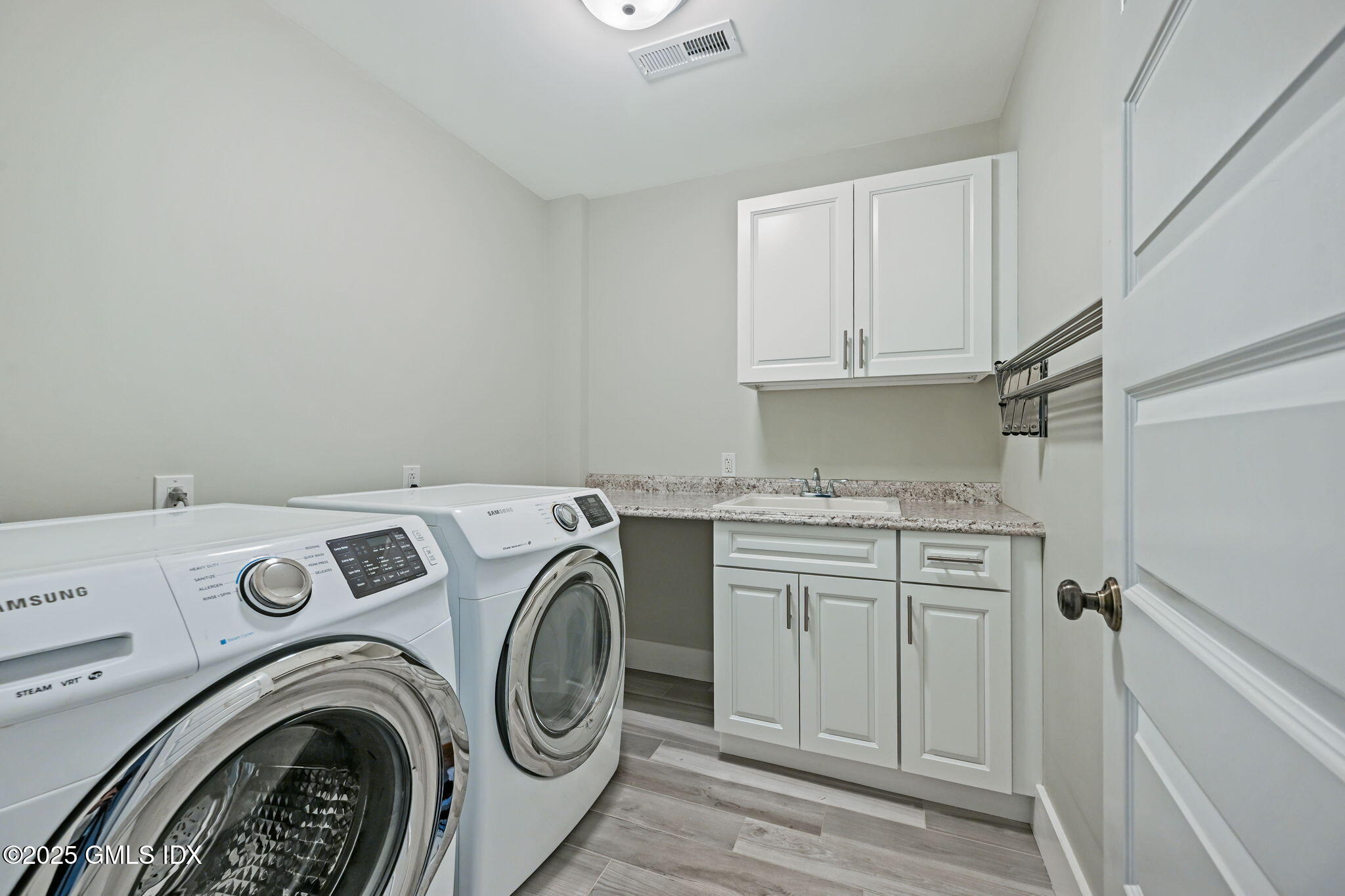 12 Old Wagon Road Old Greenwich, CT 06870 - Photo 43 of 57 a utility room with dryer and washer