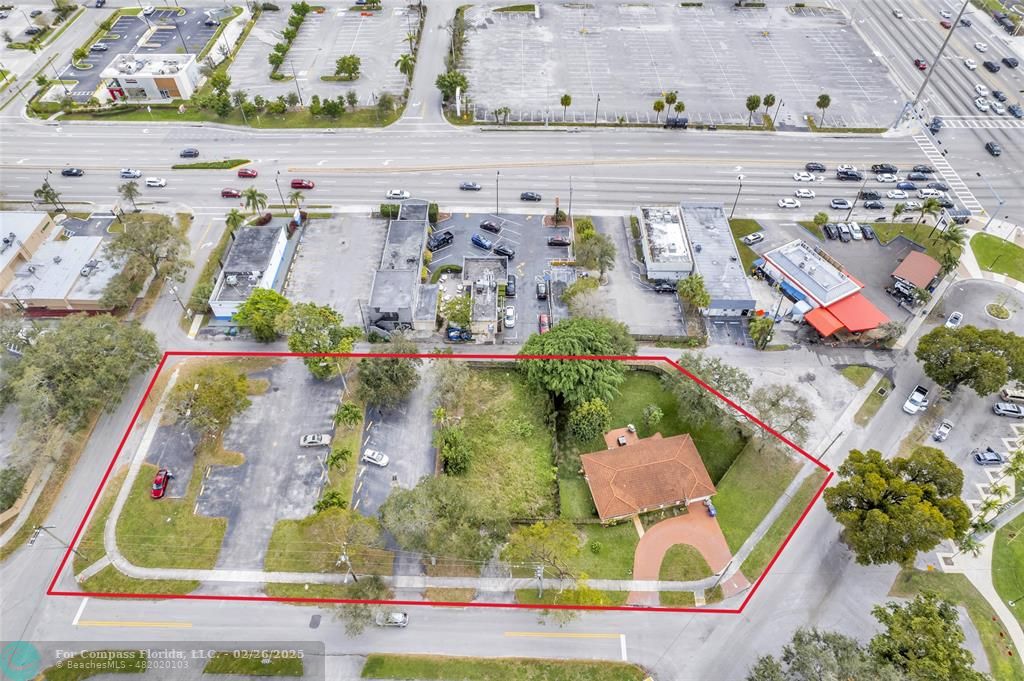 5912 Tyler Street Hollywood, FL 33021 - Photo 1 of 17 an aerial view of houses with outdoor space