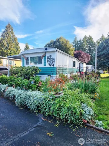 a house view with a garden space