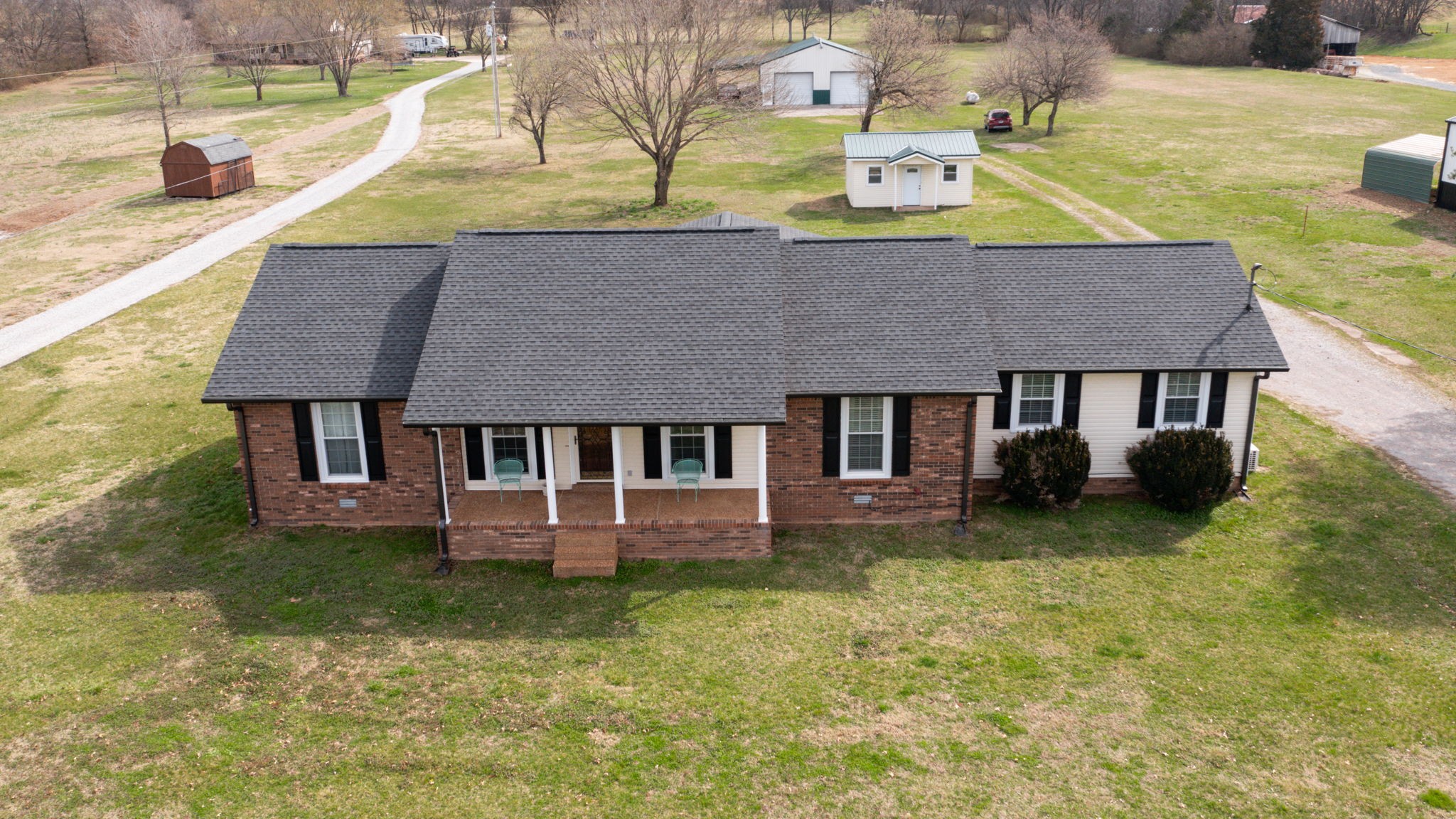 3149 Les Chappell Road Spring Hill, TN 37174 - Photo 3 of 48 a aerial view of a house with swimming pool