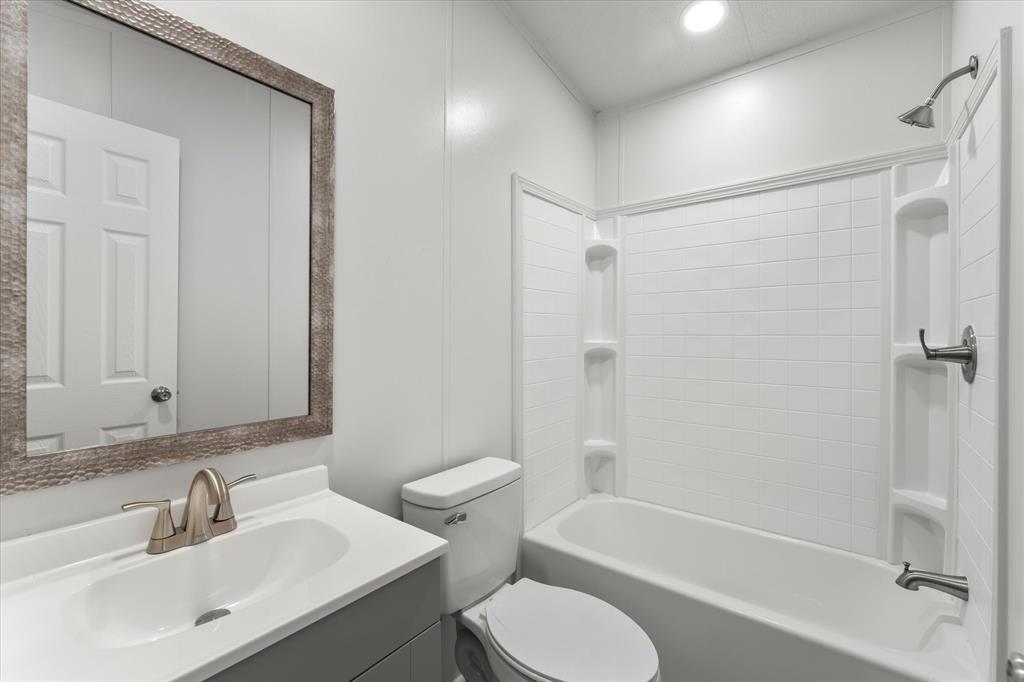 367 Box Road Gun Barrel City, TX 75156 - Photo 19 of 25 a bathroom with a sink toilet and shower