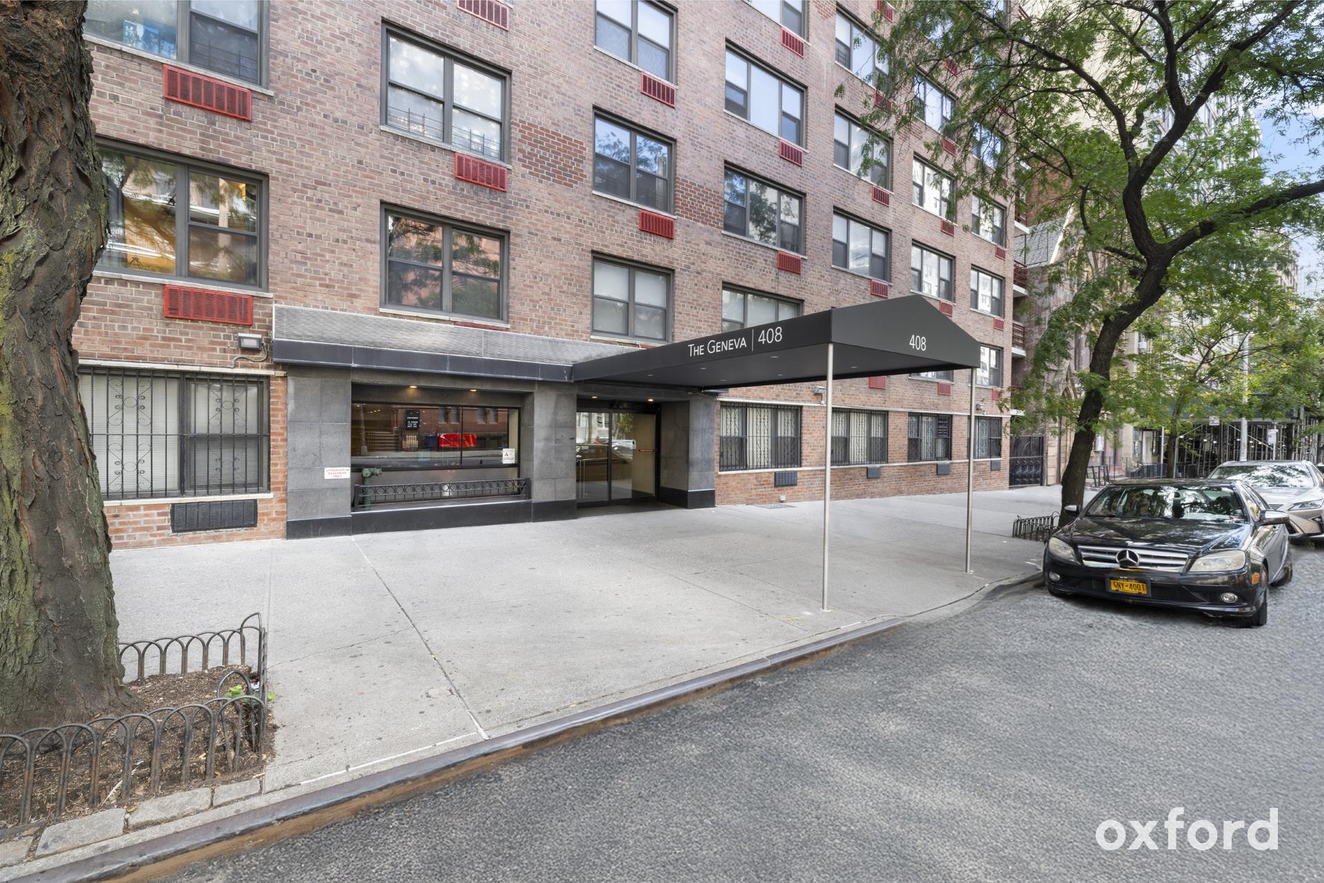 Undisclosed Address Manhattan, NY 10019 - Photo 15 of 20 a car parked in front of a building