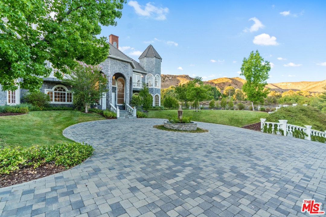 28845 Medea Mesa Road Agoura Hills, CA 91301 - Photo 12 of 12 a front view of a house with garden