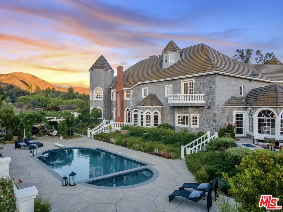 28845 Medea Mesa Road Agoura Hills, CA 91301 - Photo 3 of 12 a view of multiple houses with a yard