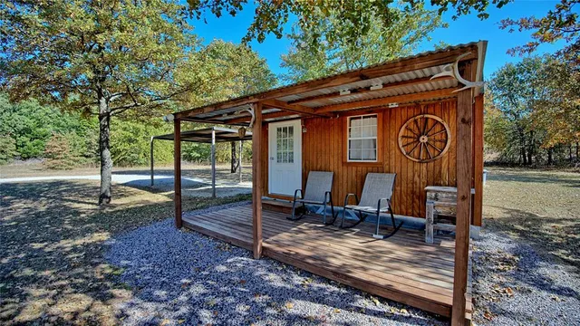 a bed sitting in a room next to a window
